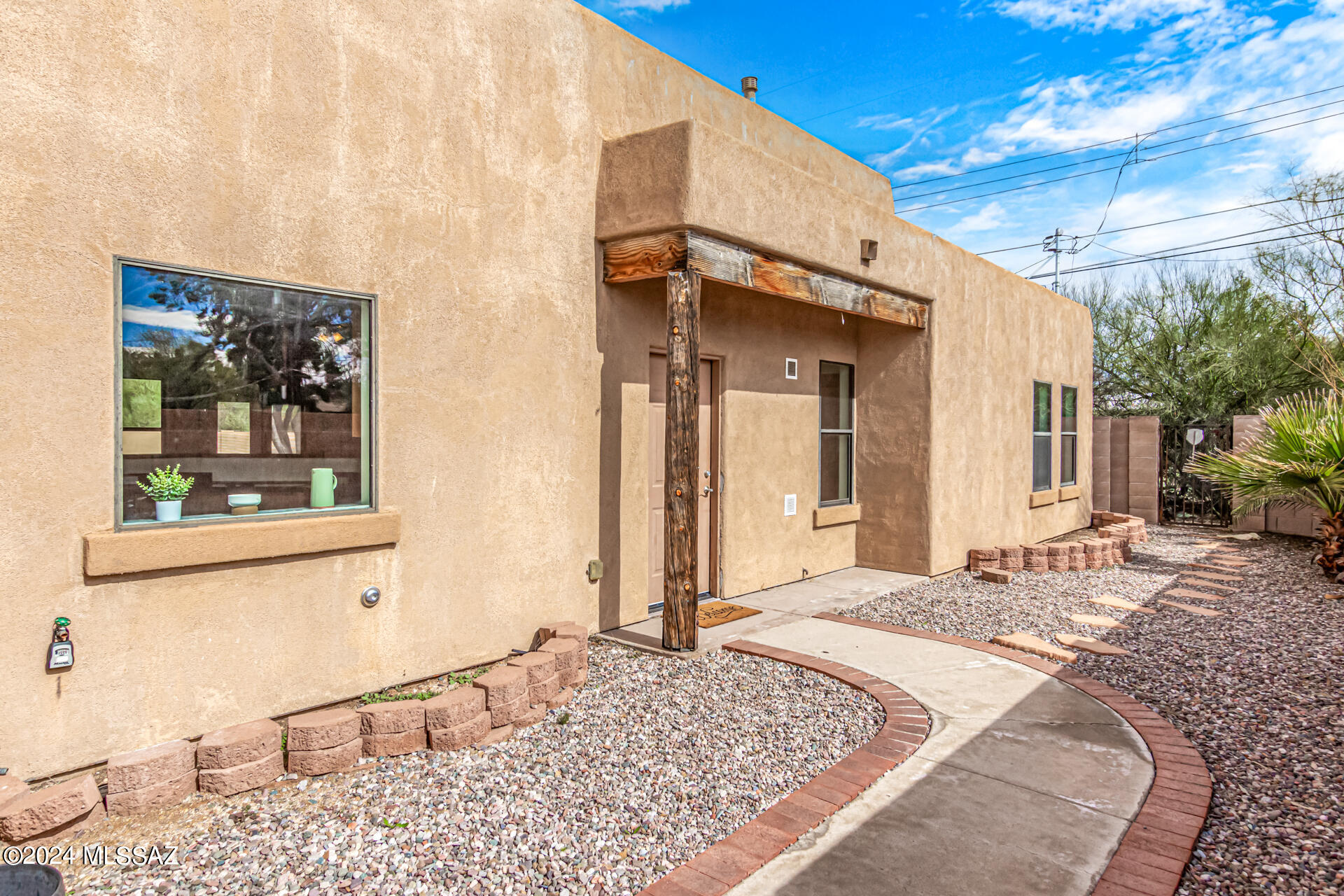 Seller will accept or counter offers between $397,000 and $415,000 dollars. Mountain views? Yes please! Walking distance to local eats and Trader Joe's! This home has been freshly painted! Discover a welcoming interior with a bright great room, a skylight, custom concrete floors throughout the entire house, French doors leading to the backyard, and a neutral palette. Practice your cooking skills in this impeccable kitchen, fully equipped with SS appliances, honey oak cabinets, recessed lighting, and plenty of counter space. The spacious main bedroom includes a private bathroom with dual sinks and a separate tub for added comfort.