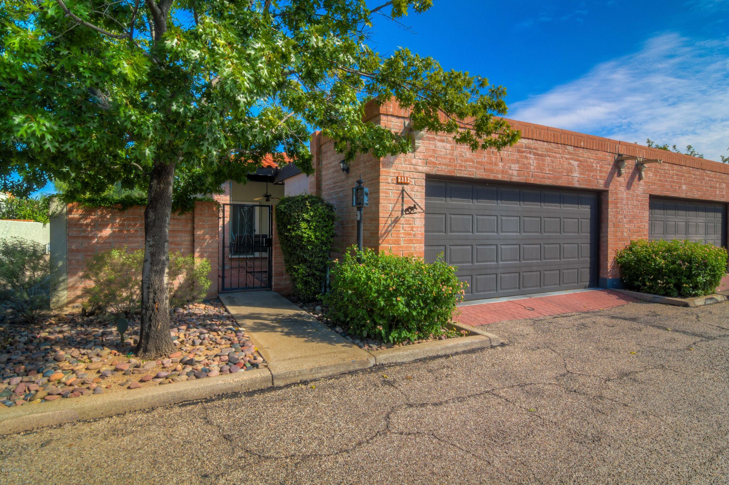 Beautifully updated NE Town Home shows like a model! Remodeled kitchen features new cabinets & pulls, quartz counters & glass back splash, new appliances, & updated lighting. Baths feature quartz counters, updated cabinets & pulls, new lighting, master features a large custom walk-in shower. Fresh interior paint, updated lighting, updated electric outlets & switches throughout. Den features new wood laminate flooring. Updated ceiling fans throughout. Outdoor shed is HOA approved. Yard features brick patio, fruit trees, covered seating areas. Bright and welcoming, this 3BR/2BA/2Car Garage home is move-in ready!
