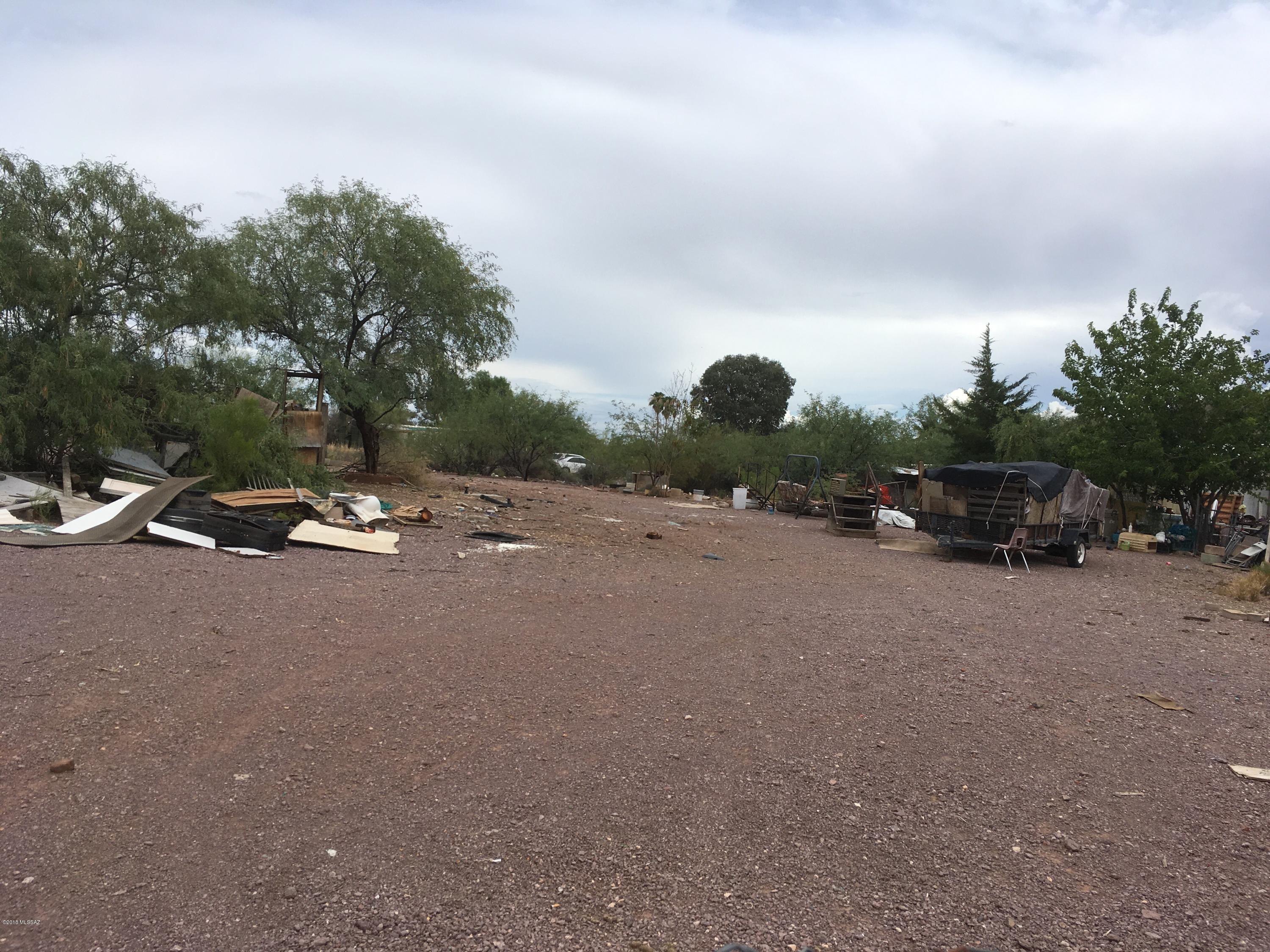 Commercial storage lot - completely fenced with access from easement off Valencia.  Easy in, easy out.