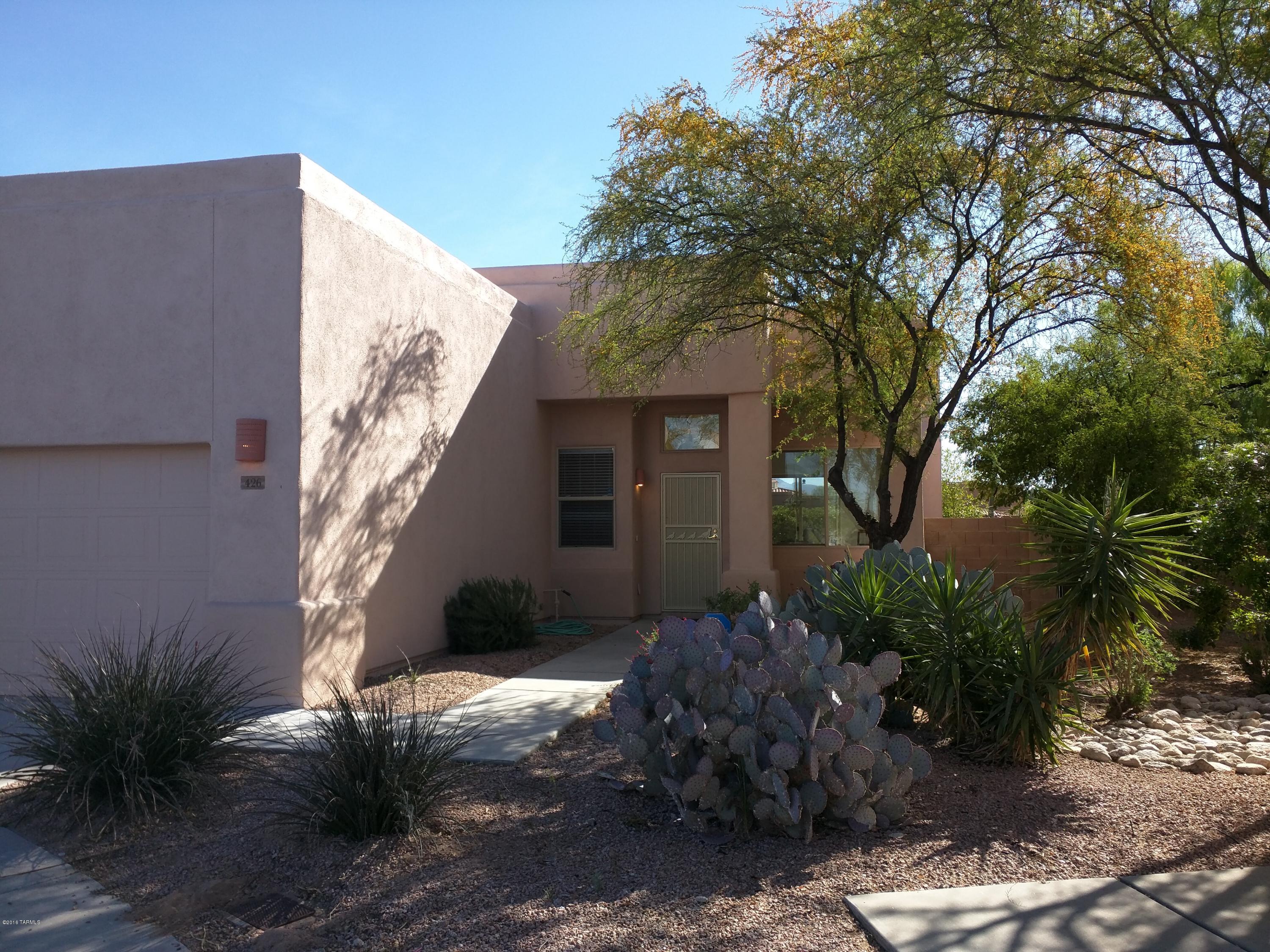 Location, Location, Location. Tucked in a quiet cul-de-sac in the foothills yet 1 mile to shopping and less 10 minutes to Tucson Mall. Repainted inside and out. New carpeting and tile. New granite countertops, sink and microwave, New blinds, irrigation, and ceiling fans. Perfect first time or retirement home, lock and leave or great rental. All the work is done- just move in.
