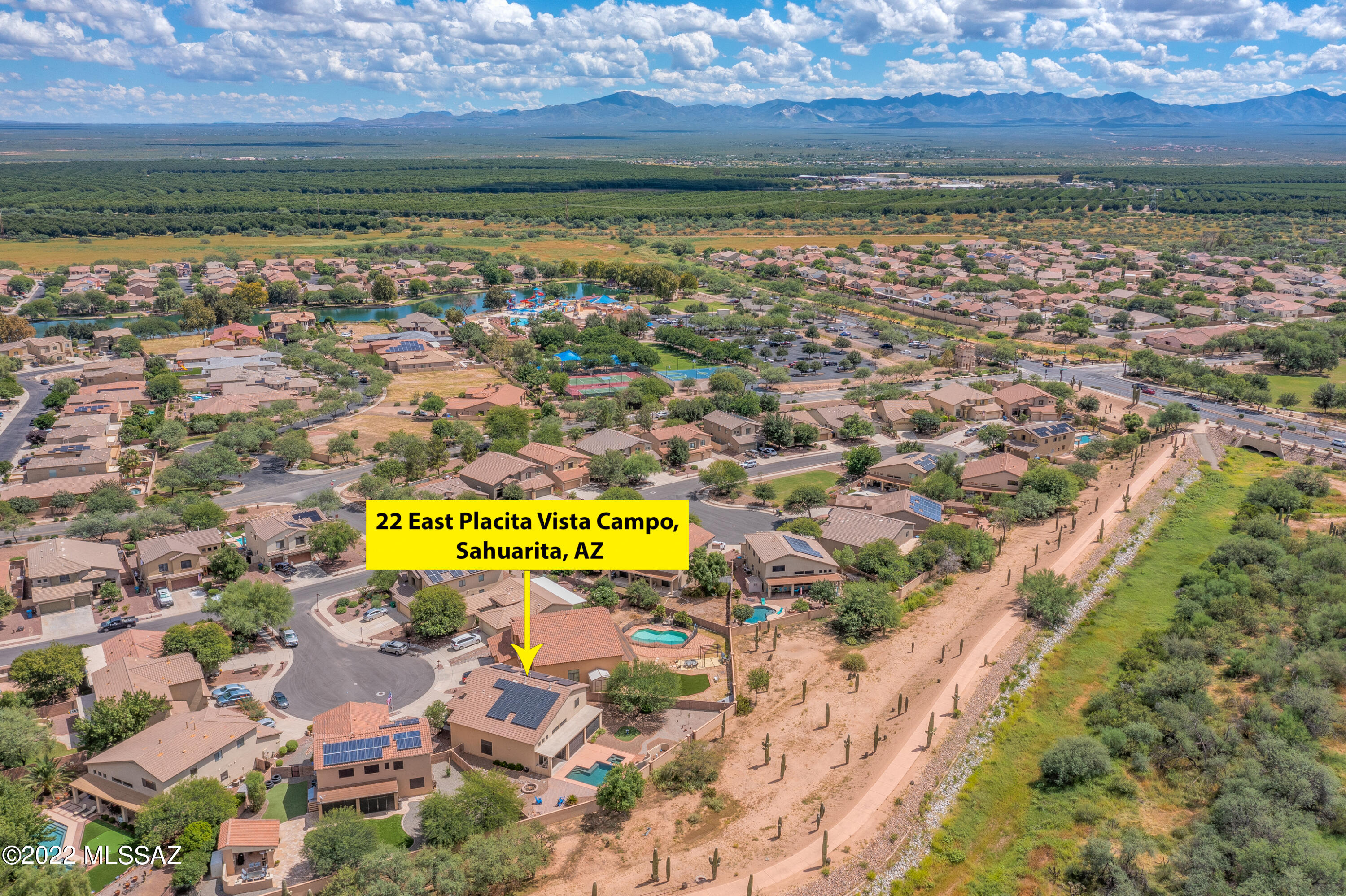 Welcome home! Literally one of the finest homes in Rancho Sahuarita, this home has it all. Prime location in the bottom of a cul-de-sac. 2 blocks over from the clubhouse/lake. Backyard access to the Wilderness Trail and K-8 Anza Trail School. Inside you'll be greeted by diagonal set REAL travertine stone floors. Formal Living & Dining. Soaring ceilings in the family room w/fireplace and entertainment niche. Spacious kitchen w/breakfast bar island, stainless appliances, granite counters & tons of cabinet space. DOWNSTAIRS MASTER SUITE has been totally remodeled. Massive shower w/2 heads. Upstairs are 3 bedrooms & 2 full baths, all remodeled, and a den/exercise room. In the huge backyard, enjoy the heated pool & spa, 2 firepits, waterfall, screened patio, shed, & gas BBQ grill. Solar lease! So many more upgrades/updates! Master Suite: waterproof luxury vinyl plank floors, custom lighting, custom barn door, custom cabinets, tile work, mirrors, smart toilet/commode, custom shower, organized walk-in closet.
Family Room: gas fireplace, surround sound speakers.
Kitchen: under cabinet lighting, custom backsplash, newer stainless appliances.
Ceiling fans throughout.
Outside: New b-hive backyard irrigation system, 2 firepits, screened-in patio, built-in gas grill, heated pool and spa, waterfall, under eaves outlets, shed.
Garage: overhead storage.
Windows: newer windows on main floor on west side & master bath. Solar screens on South and West side of home.
Smart Home: security alarm, ring doorbell, nest thermostat, smart commode in master bath,.
Additional Features: Water softener, reverse osmosis water system, newer air conditioner (2 yrs old), newer hot water heater.