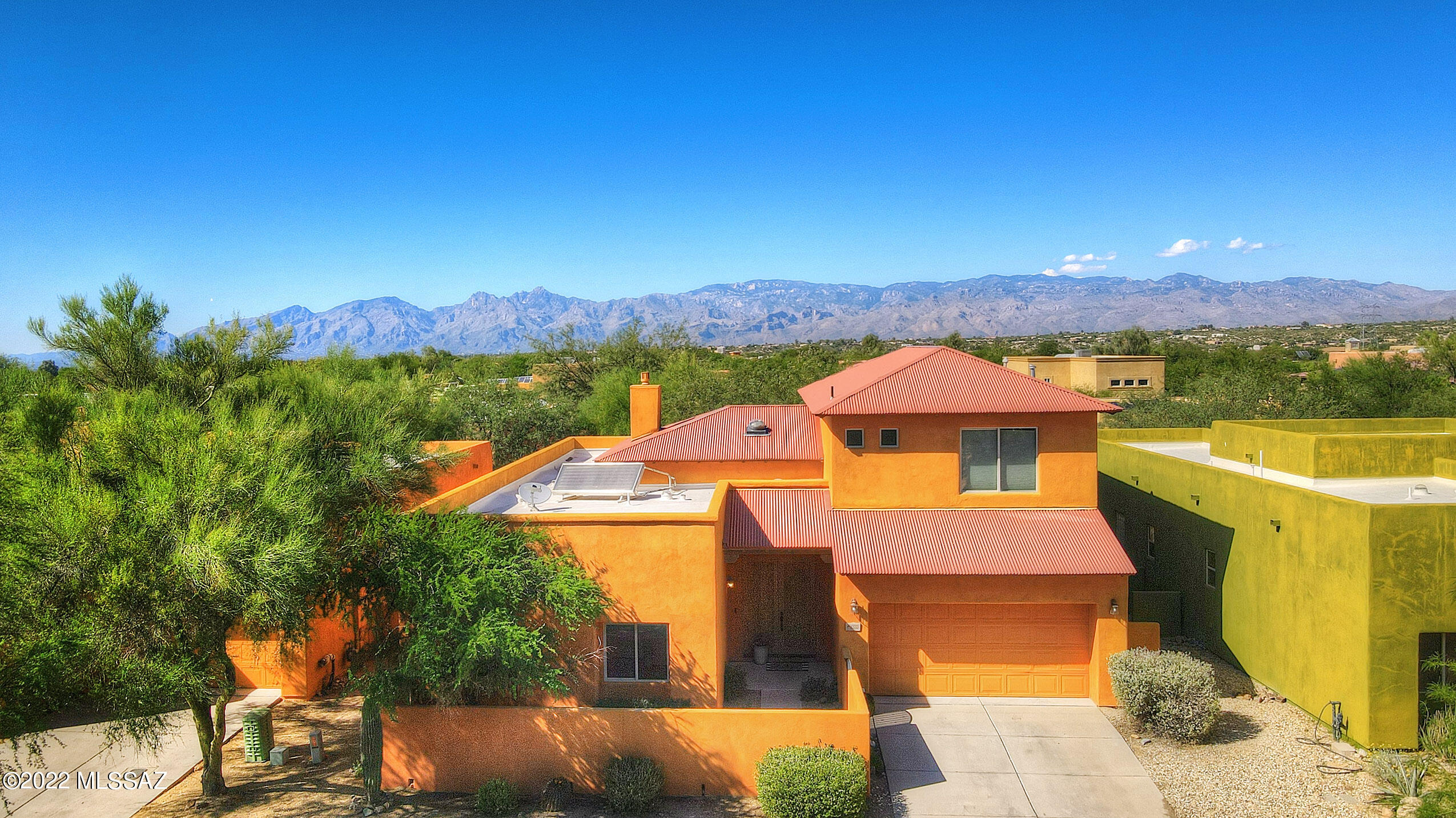 Rare spacious 5-bedroom home in highly coveted Civano. Vaulted ceilings, solar tubes, and bountiful windows make this home feel cheery and bright. Enjoy walking paths, 2 community pools, a basketball court, a grassy soccer field (only a few houses down), and a community garden. Experience the wonderful community of Civano.