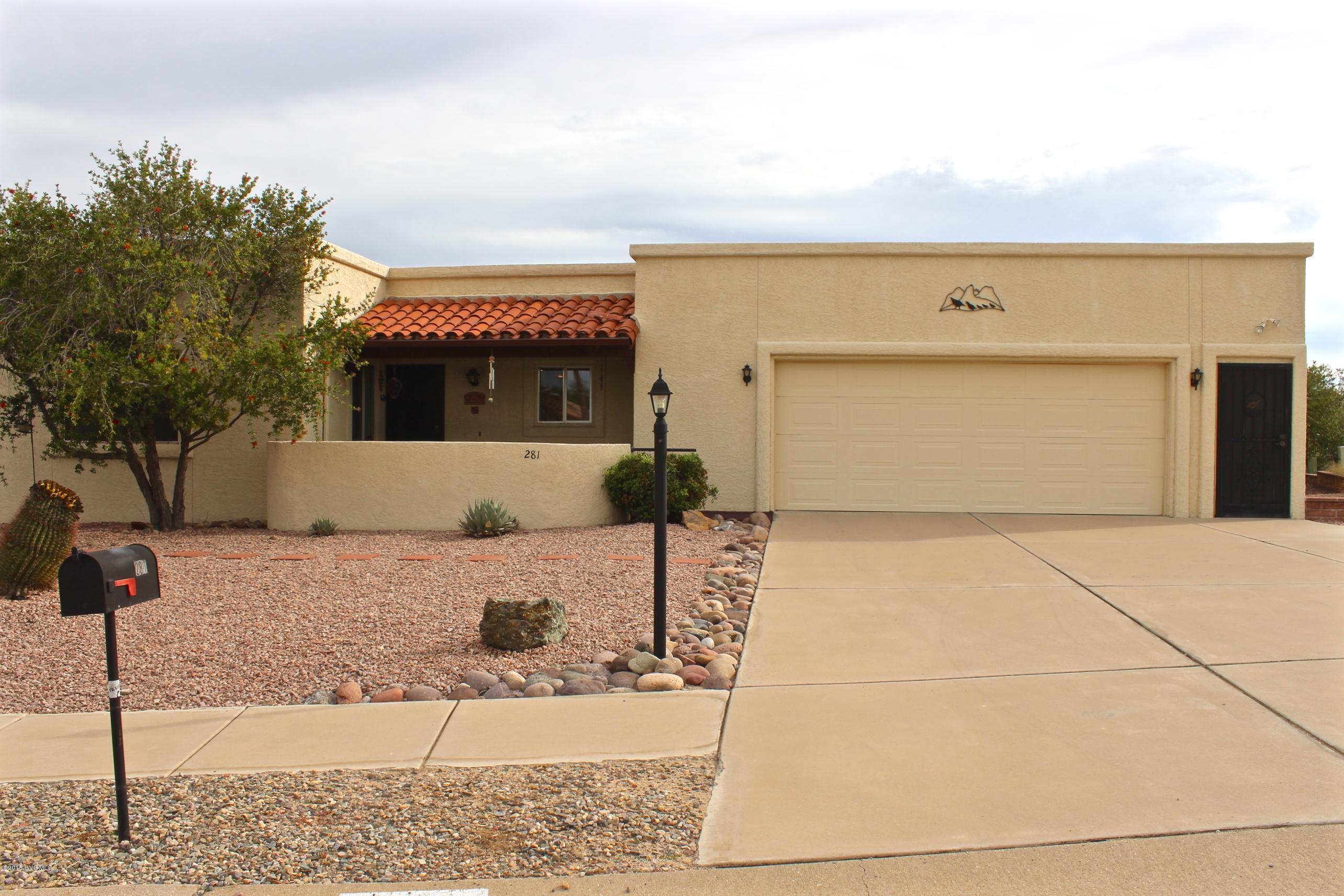 Scenic Mountain View... that just says it all. This home's back patio view will leave you wishing you lived in Green Valley all year round! If you can break away from gazing at the azure sky, you will find a property complete & ready to move in with furnishings included. This house allows you to grow into your golden years as you need additional safety & handicap features. Smooth ramped entry to the back patio, Roll in Master shower, Grab bars, roll in bathroom vanity, wide hallway & doorways, & a special roll in counter in the kitchen. The extended garage is extra wide with laundry, utility sink, & a separate hobby room. NEW refrigerator, dishwasher barely used, termite warranty, roof has just been re-coated with a warranty, & a BIG highlight is the brand NEW HVAC for heating & cooling!