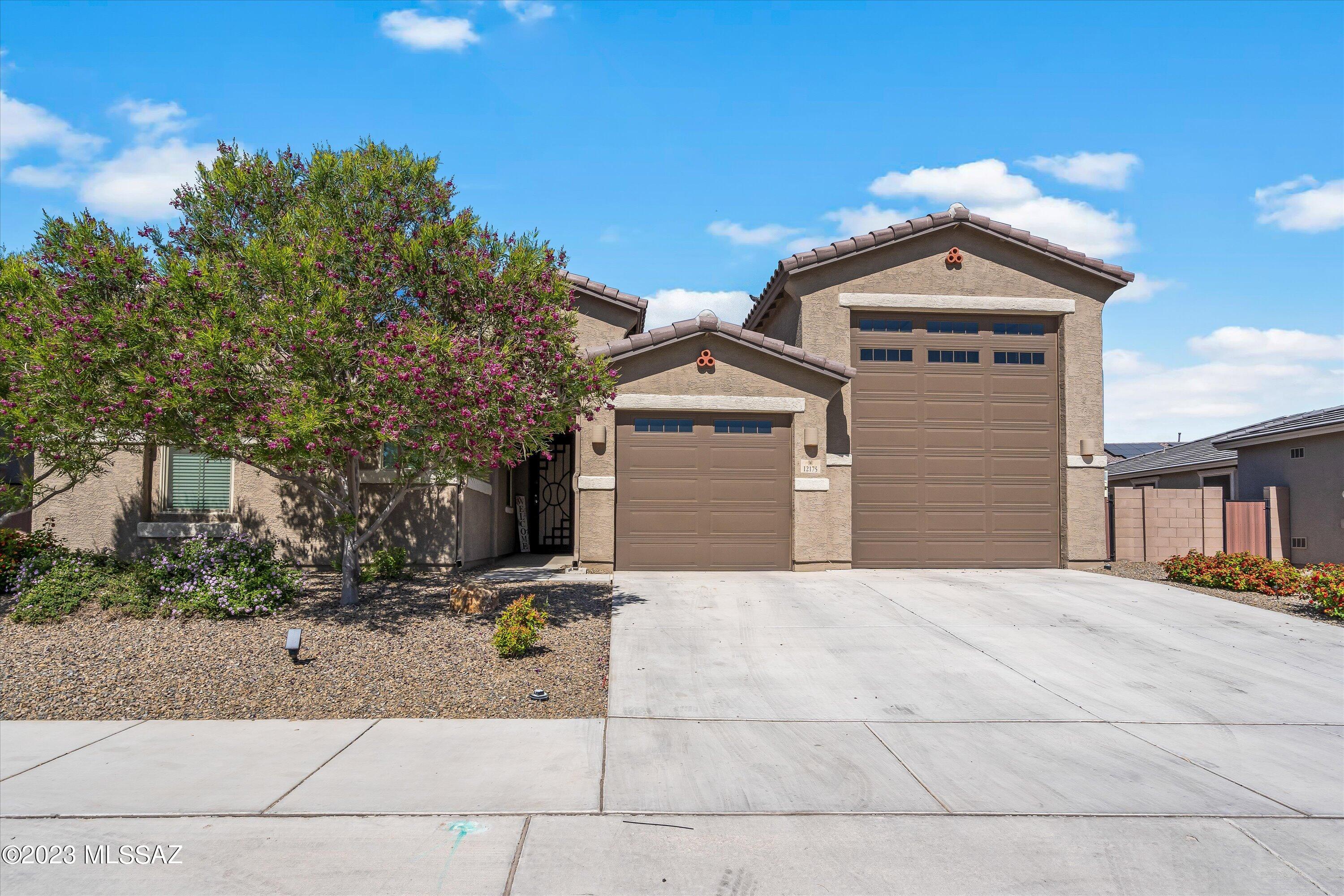 WOW! Look at this home. It has room for ALL the toys! PLUS one of the most desirable floor plans. It has 3 bedrooms + den with double doors so it can easily be used as a bedroom if you prefer. The Deacon floor plan features two bedrooms just off the entry, each with access to a full bathroom. The large kitchen overlooks the great room and formal dining area or, whatever you prefer this space to be.   The large kitchen island is perfect for enjoying your meals, and a gathering spot for get-togethers  The walk in pantry is good size and has plenty of room for storage.  The bonus space by the laundry room has cabinets and is the perfect spot to store items that you use as you come and go.  It's a convenient drop off and pick up spot! The master bedroom is good size and overlooks the backyard Please check out the electric bills and the savings with solar.  The sellers are willing to pay it off with a full price offer.
There is a splash pad close by (not HOA), and also a grocery is coming soon.  Don't miss out on this opportunity.