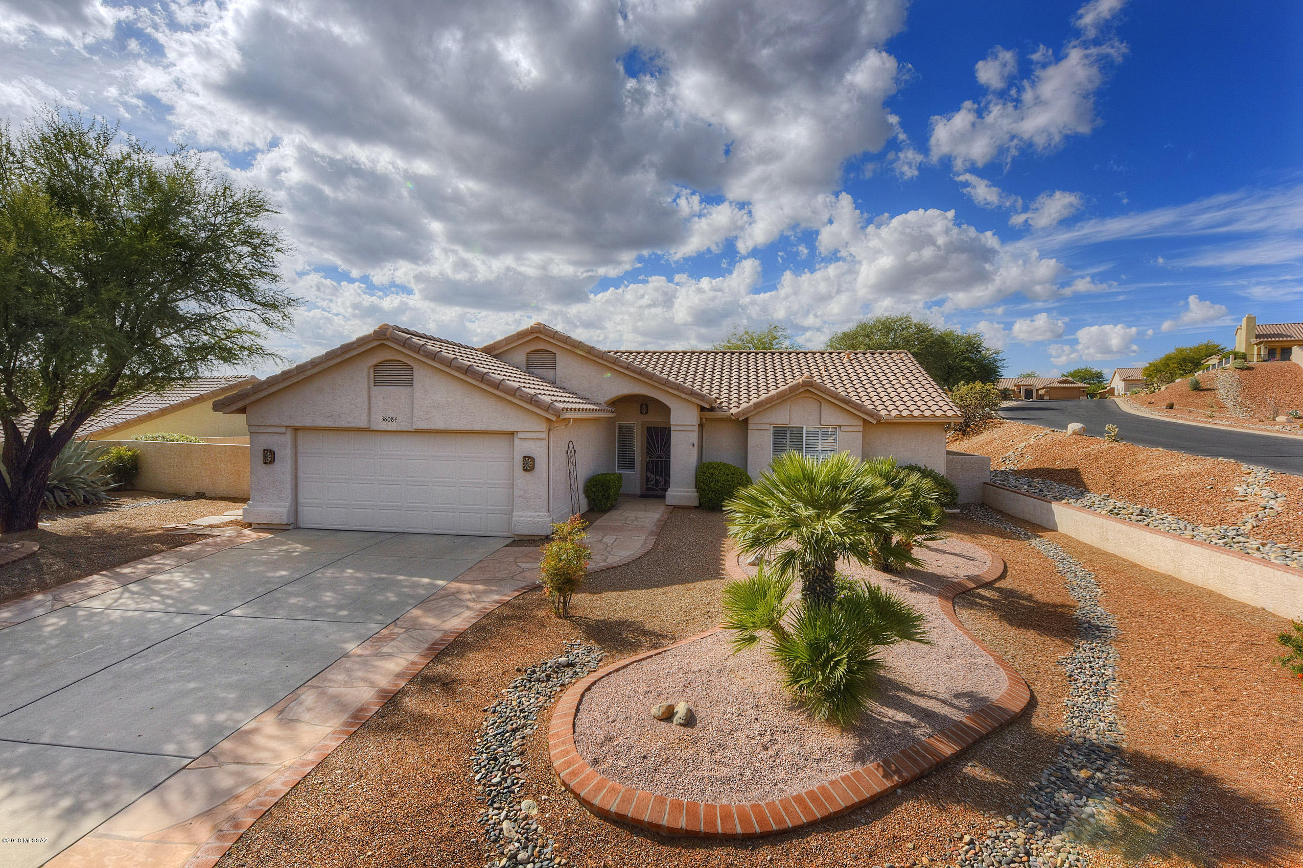 Welcome to this Sensational Sonora.  This home is customized all the way around.  The upgrades including an oversized guest house are just terrific.  There are granite counters in the entire main home.  You have a cooktop & wall oven instead of the slide-in range normally offered in this model.  You have a lovely great room & den in the main house, 2 full baths & master as well as nicely appointed kitchen/dining. Then you get to the casita with its own water heater and specialized air conditioning & heat, separate bath and views.   The home site offers views and privacy on all sides.  Located on a corner and cul-de-sac, this home has it all.  It is a lightly used snowbird residence!