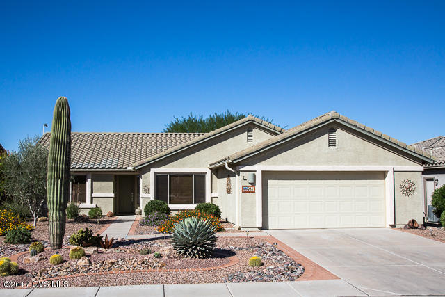 Popular Expanded Laredo model offers 1972 square feet of living space & a desirable split floor plan w/2 Bedrooms, 2 Baths & Den. Tile in the Kitchen, Laundry, Den & Baths. Carpet in the Bedrooms & Great Room. Windows treated w/UV ray film. Ceiling Fans in all living areas. The Den has Built-in Bookcase & Cabinets. Large Great Room w/dining area. Designer paint colors thruout the home. Kitchen has oak cabinets, granite counters & an island. Pull-outs in lower cabinets. Breakfast Nook has partial mountain views. Both Bedrooms have bay windows & closet organizers The Master Bath has a walk-in shower, dual sink vanities & a large Master Closet w/Built-ins. Large Laundry room w/storage cabinets - washer & dryer included! FOUR FOOT EXTENDED Garage has Built-in Cabinets, epoxy coated  floor, work bench w/lighting, insulated garage door & screen system for ventilation. Beautiful backyard with Built-in BBQ & mature landscaping. Patio has ceiling fans & retractable awnings. Low voltage & solar landscape lights. Solar tubes in Master Closet, Laundry Room & Garage. Water softener/Filter system   no salt. Phantom screens at front door & Patio sliders. Gutters on house. No pets ever lived in home. View this house and make it your new home!