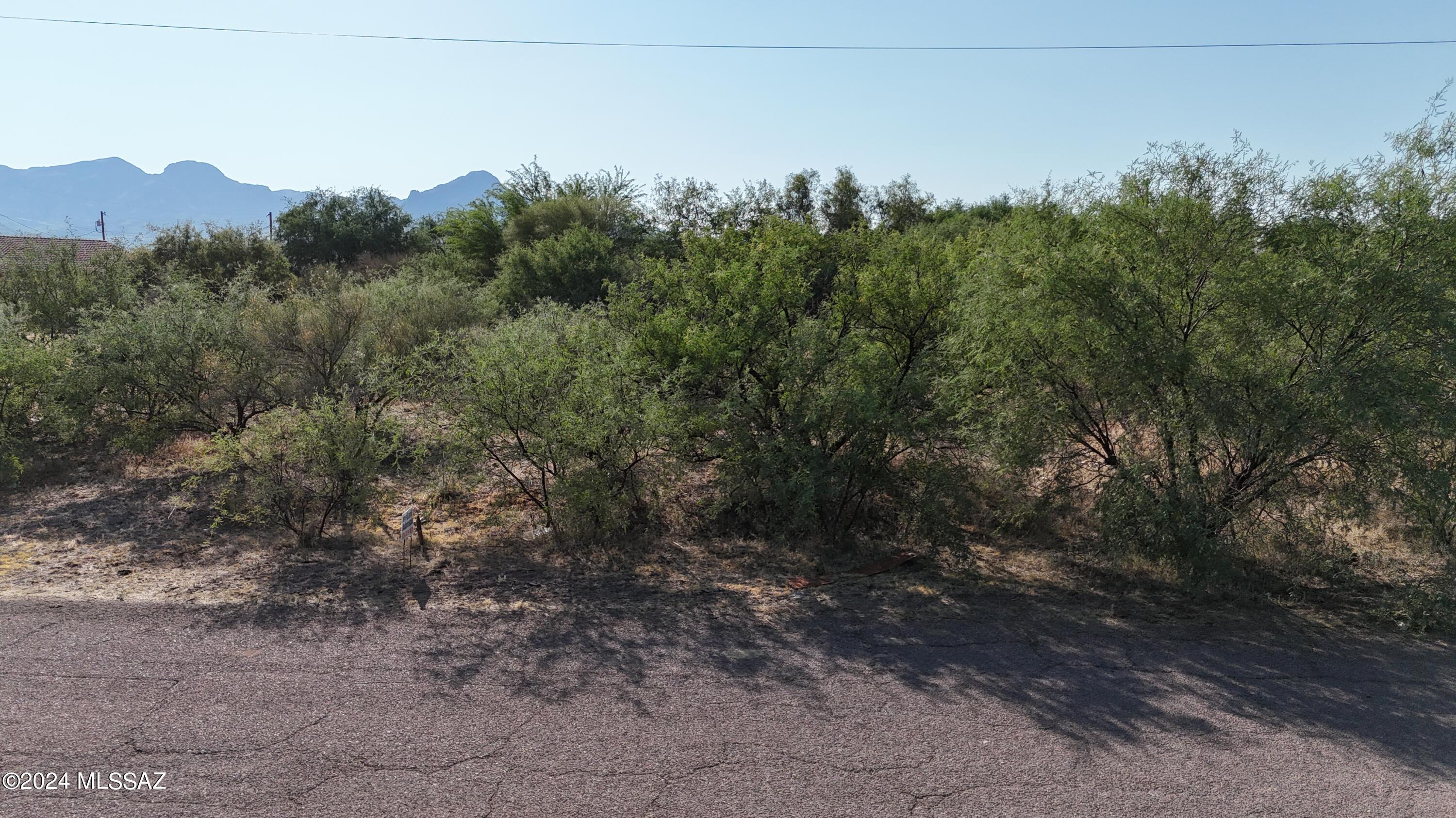 Flat residential lot in great location, close to highway access, all paved roads.