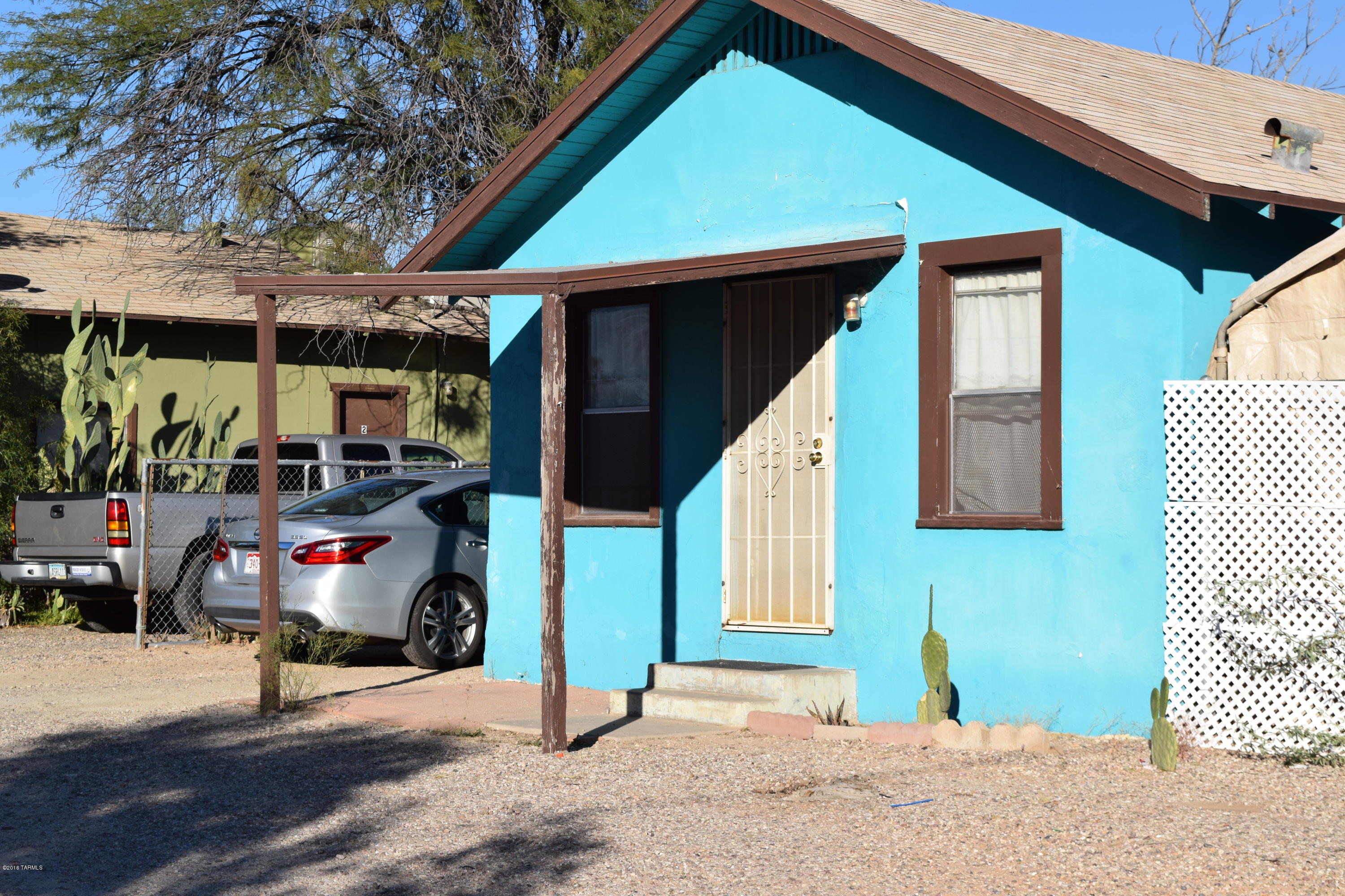 Two adjacent properties being sold together, 519 Navajo and 525 Navajo. Great opportunity for income potential. Three 2 bedroom 1 bath units and 1 three bedroom 2 bath main house on adjacent lot. Zoned R3…so many possibilities.