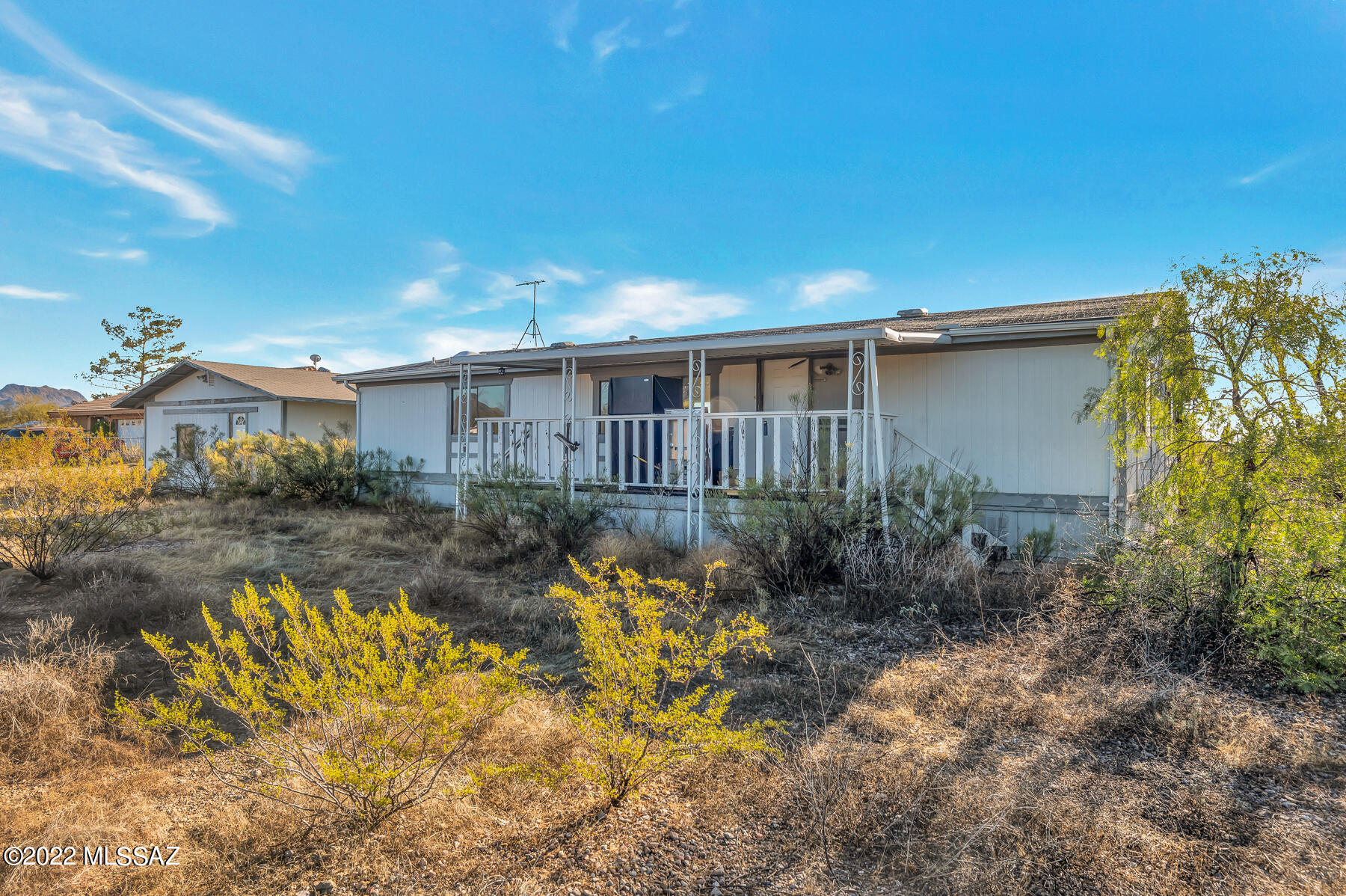 28 x 56 3 bedroom, 2 full bath manufactured home with 2 porches-10 x 33 and 8 x 24.  Has 24 x 24 building which could be used as a garage or workshop.  This property is on one full acre with extra RV hookups.  It is chain link fenced and the home is freshly painted throughout interior.  Seller will carry with 20% down, 6% interest for 10 to 12 years.  

Property being sold in ''as is'' condition with no warranties.  It is a fixup.  Some appliances are on the porch.