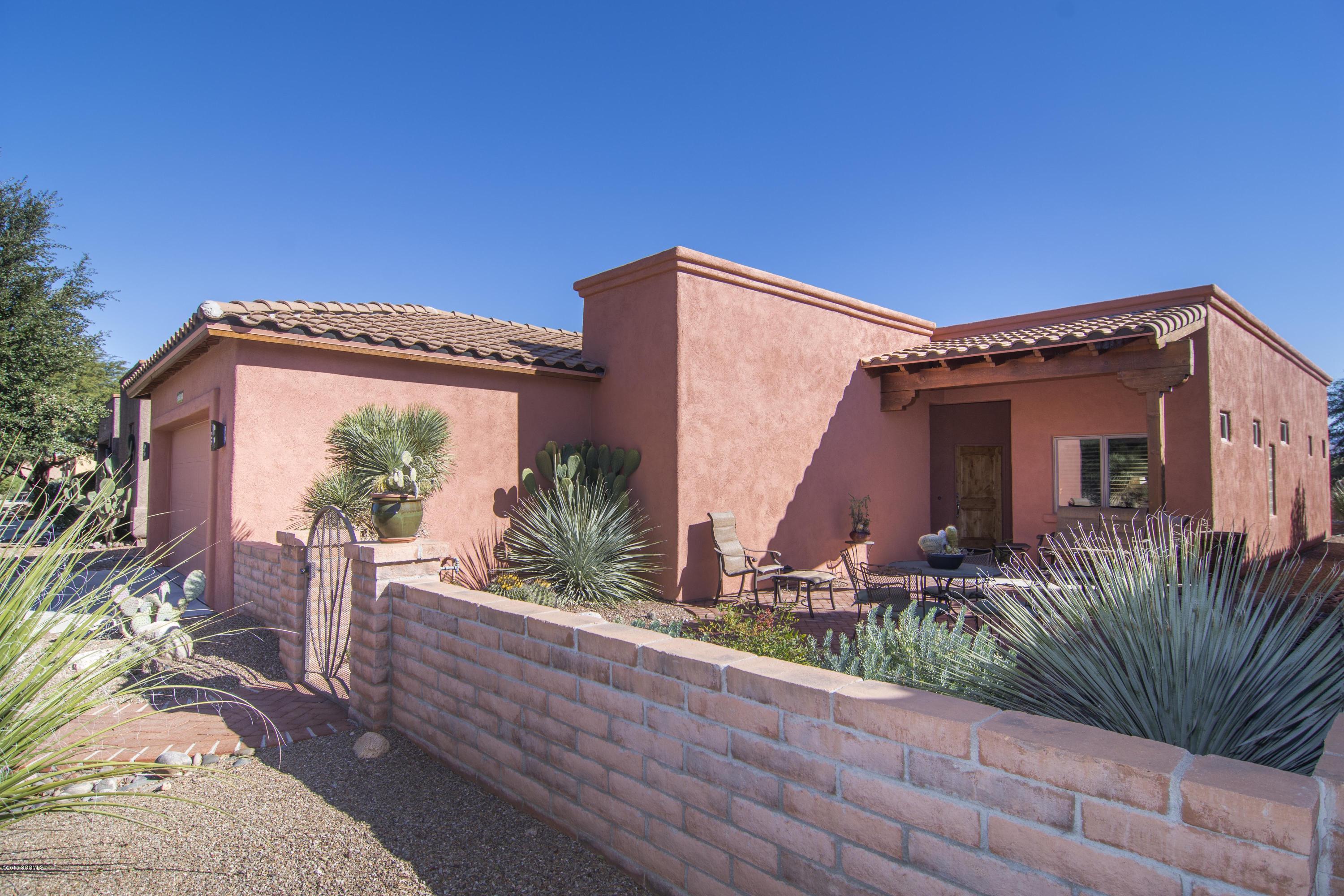 Price reduction makes this the lowest price per square foot single family home in Barrio De Tubac. Lovely home in the sought-after San Miguel subdivision in Barrio De Tubac.This impeccably maintained 2 bedroom plus den home has many upgrades and is filled with natural light. Just a short walk (2 blocks) to the shops and restaurants of Tubac Village. Panoramic views of the Santa Rita Mountains from the covered back patio, and the entry courtyard is walled and gated.
