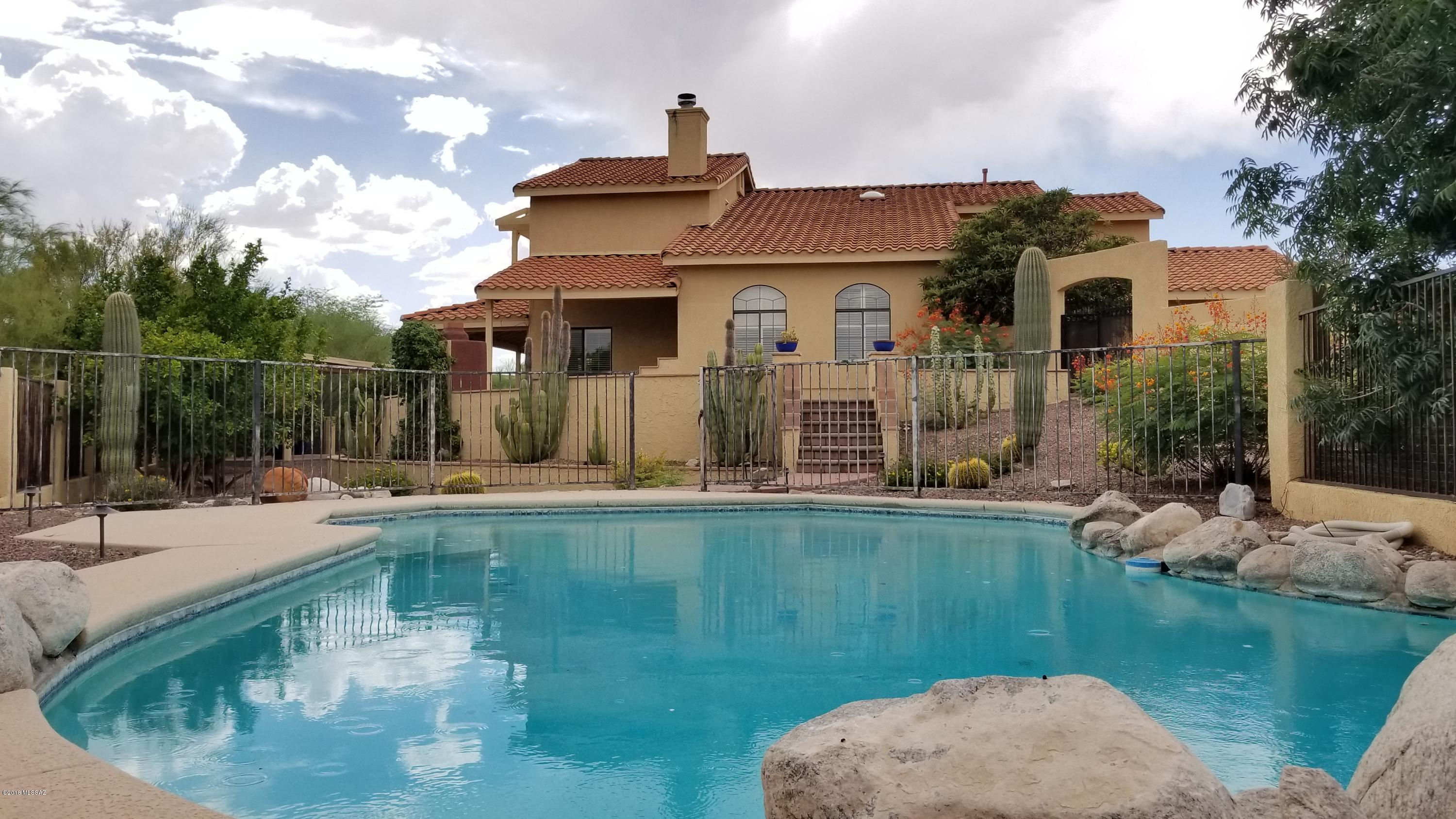 Built 1989. Gorgeous 4 bedroom/3 bath home in the heart of the foothills. Breathtaking views and space to spread out and entertain. Large kitchen features stainless steel gas cooktop, fridge, built-in microwave, oven, dishwasher, with center-island, granite counters, dark wood cabinets, and nook. Huge backyard features multiple covered patios, outdoor fireplace,sparkling pool! Barbecue ''AS IS'' W/D incl. Master bedroom features a private bath, dual sinks and a sit-in vanity, relaxing tub, and separate shower. 2-car garage.Pool service,  bi-monthly landscaping included. Security Deposit $4,650. Dogs allowed no aggressive breeds or puppies plus $25.00 pet rent/pet. **$28. Mandatory enrollment in Resident Benefit Package.  Includes HVAC filter delivery, cable internet concierge service and m