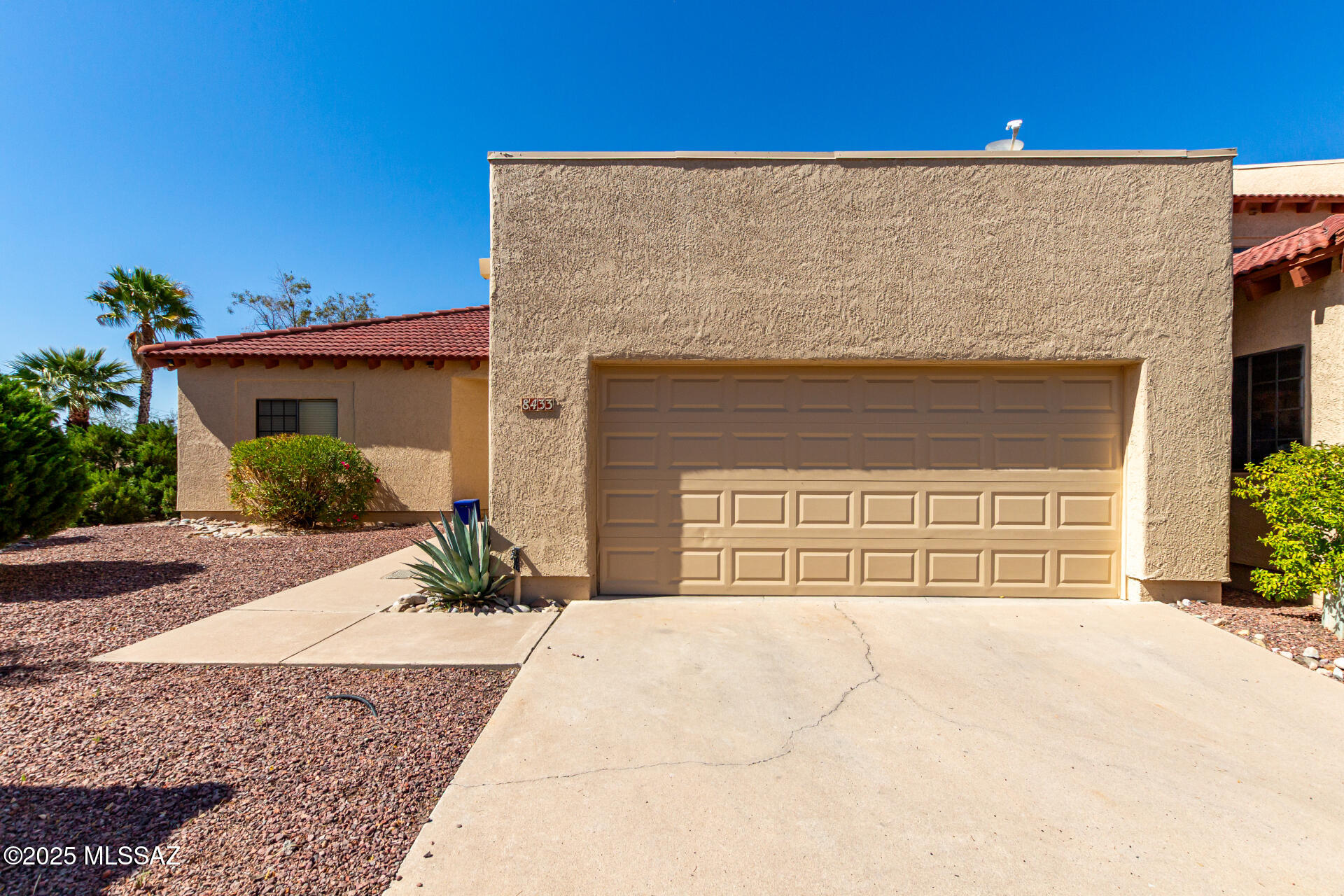 Tastefully remodeled all throughout, from the kitchen counter tops and cabinets to floors, the bathroom vanities, showers, tubs etc. Located close to shopping, restaurants, and much more yet tucked away in a very cul de sac featuring a gorgeous view of the Catalinas and next to big common area for extra privacy. New roof installed May '22 and  new A/C in July -22. Furnishings available on separate bill of sale.