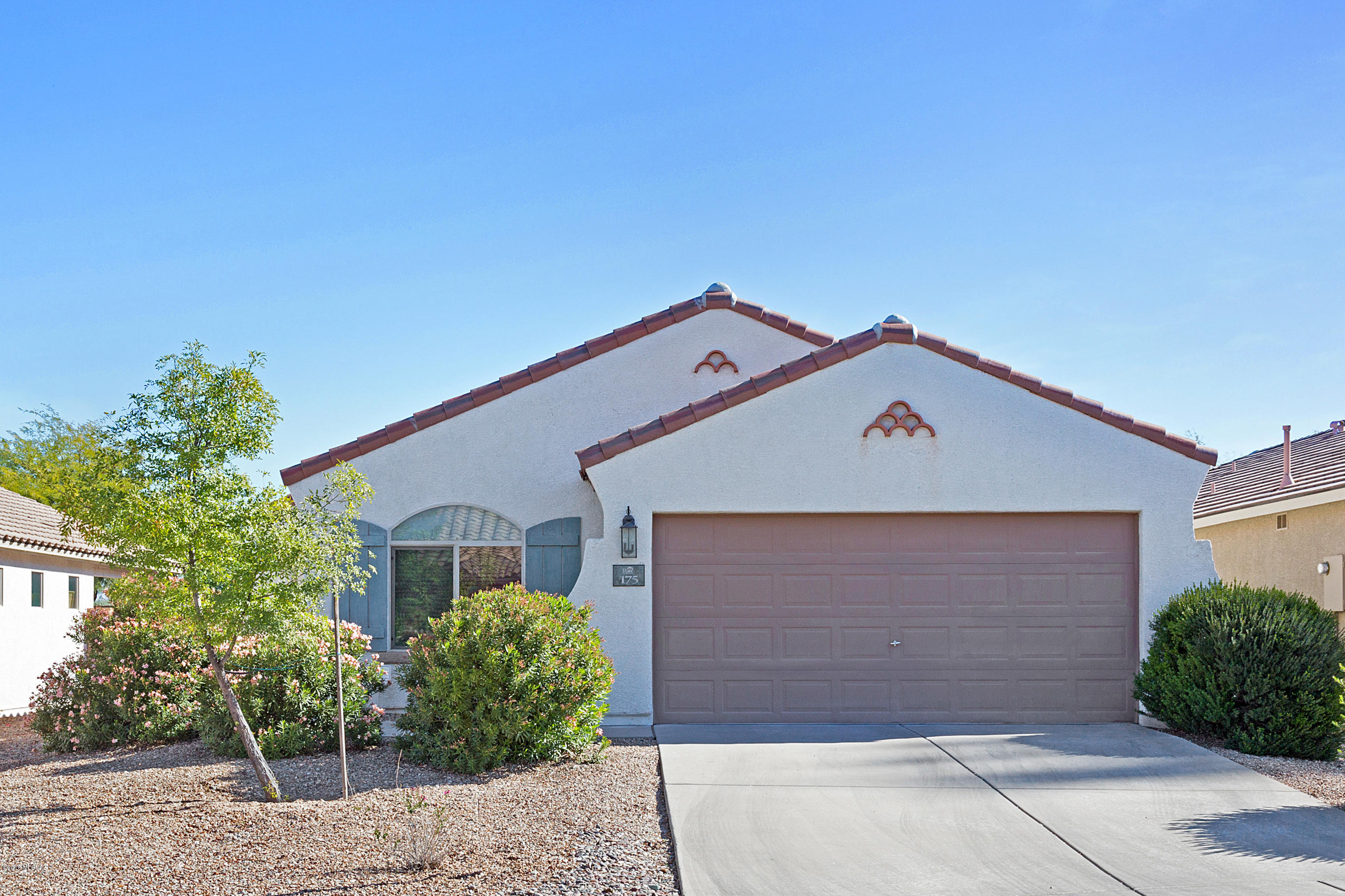 Don't miss this east side gem! Located in the Serenata subdivision, this Pulte build home is ready and waiting for you. Within walking distance of grocery stores, restaurants, and yes, even Target! HIgh ceilings and an open floor plan give this home a spacious feel.  Split bedroom plan too! Easy care tile and laminate flooring, making clean up a breeze. Plenty of kitchen counter space, plus a large side x side stainless refrigerator. Do you like to entertain? You will have plenty of room for guests on the full length, covered back patio. Easy care backyard, with plenty of options to add your personal touch.  You could be in your new home by Christmas!