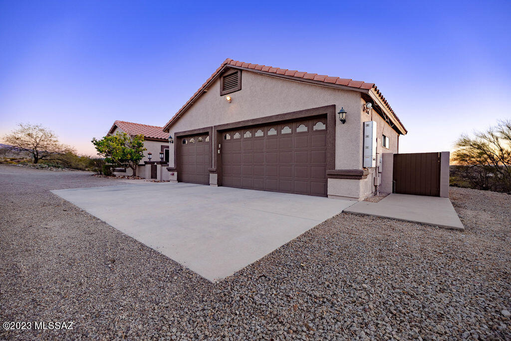 Step in to this incredible, MOVE IN Ready, custom built home on over 1 acre with gorgeous open mountain panoramic views. You will step in to high ceilings and tile floor throughout the home. There are 4 bedrooms, 3 full bathrooms, one half bath and an oversized Arizona room. The outdoor entertaining space will not disappoint with the full length patio, low care backyard landscaping and turf. The views will steal the show while entertaining in this gorgeous space. The long driveway leads to a spacious 3 car garage with lots of storage to use! Recent appraisal came in at $680,000. You don't want to miss this opportunity to make this house your home!