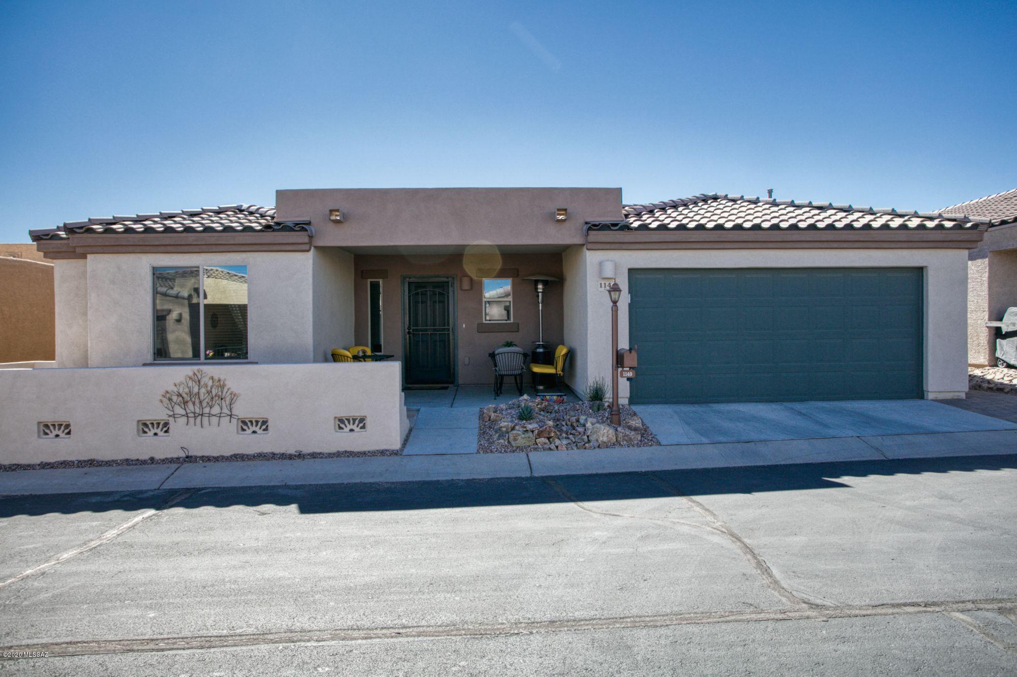 WOW! This home has it all! Den/Office, Stainless appliances, Tile & Laminate floors, Granite Counters, Pull out drawers in cabinets, Reverse Osmosis, Solar Tubes, Ceiling Fans,  2 car garage plus much more in the Award Winning Gated Community of Rancho Resort. Manicured Landscaping throughout the grounds with a 20,000 sf clubhouse, pool, spa, billiards, shops, you don't want to miss this! Retire in Style!