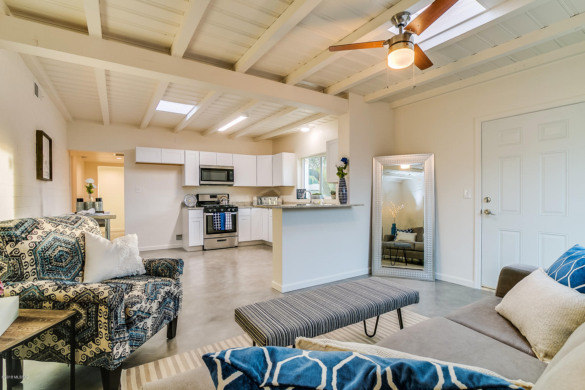 Range Price- Seller will accept or counter offers between $189,900- $199,900. Freshly Remodeled 3 Bedroom,  2 Bathroom Home in Central Tucson W/ NO HOA! Featuring  NEW Kitchen with Crisp White Cabinets, Granite Countertops,  Stainless Steel Appliances.  Eat-In Kitchen is complete with Breakfast Bar that is Open To Great Room which is Filled with Natural light and the original Tongue and Grove Ceilings.   Master Bedroom is an absolute  DREAM– Master Suite features Double Vanity,  New Shower/Tub  Combo, MASSIVE Walk-In Closet, and French doors to a PRIVATE patio.  New HVAC, Upgraded Electrical Panel, New Drip Irrigation, Concrete Floors,  Large  Secondary Bedrooms,  Double Pane Windows, and so much more!  Conveniently  Located Near Shopping, Public Transportation, Recreation, Parks, School