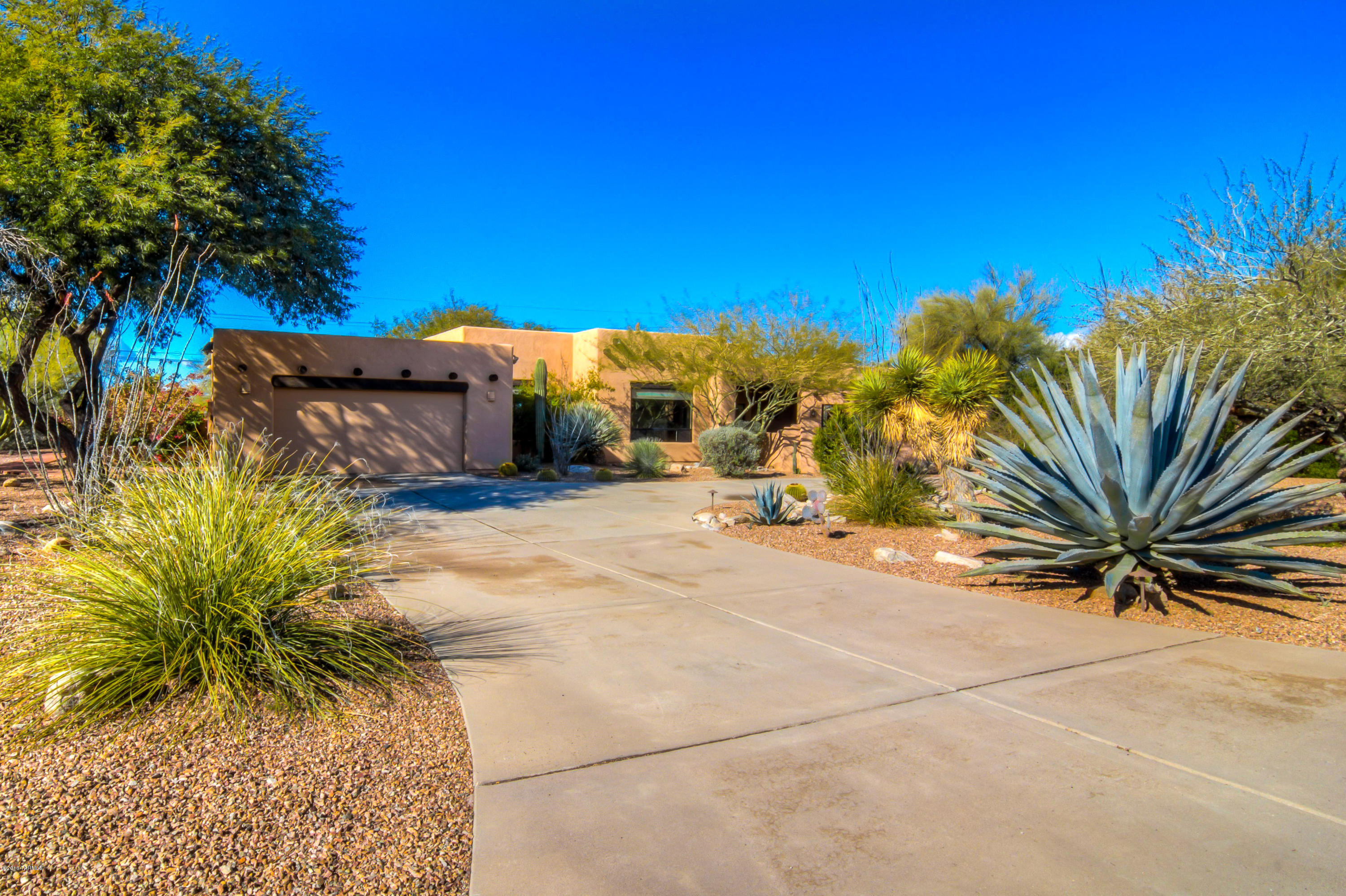 When you pull up to this property and then walk into the courtyard, you get a wonderful feeling. Open floorplan exudes warmth and comfort with complete attention to detail. From the lovely, bright kitchen with sky lights to the gorgeous updated bathrooms with custom granite this home shows beauty and quality workmanship.  there is beamed ceiling and lots of windows  overlooking the  custom designed backyard. Beautiful sunsets, fire pit, hot tub and pool surrounded by fabulous landscaping and lots of privacy. Recirculating water, sink in garage and self closing doors to pool are just some of the amenities.