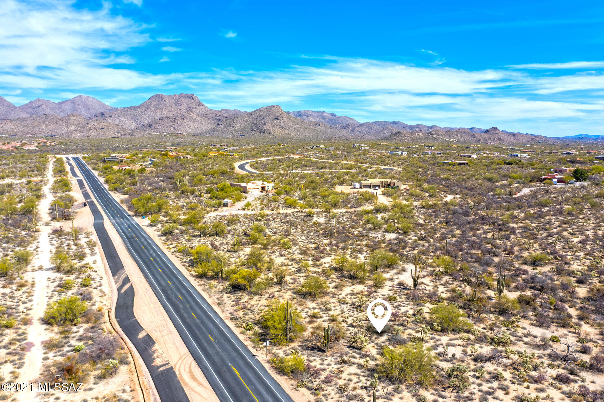 AMAZING 11 acres in MARANA AZ fronting on Newly improved Camino De Oeste with BIKE PATH.  Just North of Tangerine Rd for easy commuting. In the Foothills of the Tortolita Mtns!  Zoned R144 in MARANA.  Possibility of splitting the acreage into 3 big parcels. Surrounded by nice custom homes. Great location for a SPEC BUILDER.  Diverse SONORAN vegetation. Rolling Topography.  Great investment buy with future development potential in the path of growth. Great site for a CHURCH, with frontage on Camino De Oeste!  Water hookups with Tortolita Water Co available.  Owner has purchased 1 already, that can be transferred. Possible connections to Tucson Water available for development. Nice rectangle shape for easy for splitting.  Trico Power on Camino De Oeste.  See virtual tour for a Birds Eye View