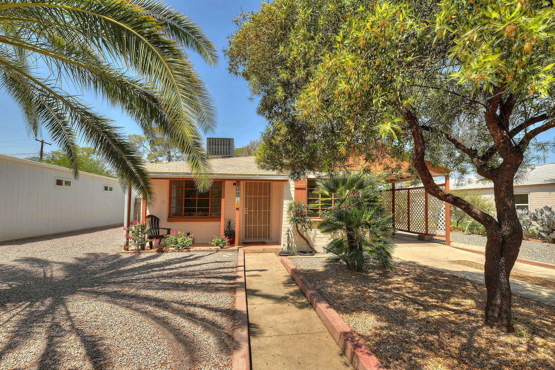 Charming 2BR Bungalow w/Carport Located in the Heart of Tucson in the Historic, Sought After & Trendy Poets Square Neighborhood. Fantastic Location Close to Shopping & Services, Downtown & Just Minutes from the U of A. Major Renovations & Updates Include; All New HVAC, Water Heater, Self-Closing Cabinets, Corian Counters w/Integrated Corian Sink, Dishwasher, Garbage Disposal, RO Filtration, Window Blinds & Security Screen Door. Newer Carpet & 13'' Porcelain Tile too. Attached 84 S.F. Shed w/Electricity Great for Storage, Workshop, Crafts, Exercise Room, etc. Tangerine, Grapefruit & Orange Trees. Large Covered Patio & Fully Fenced Backyard. No HOA, but Poets Square has a Website & Periodic Newsletter that Connects Everyone in the Community & Keeps Residents Up-To-Date on Activities.