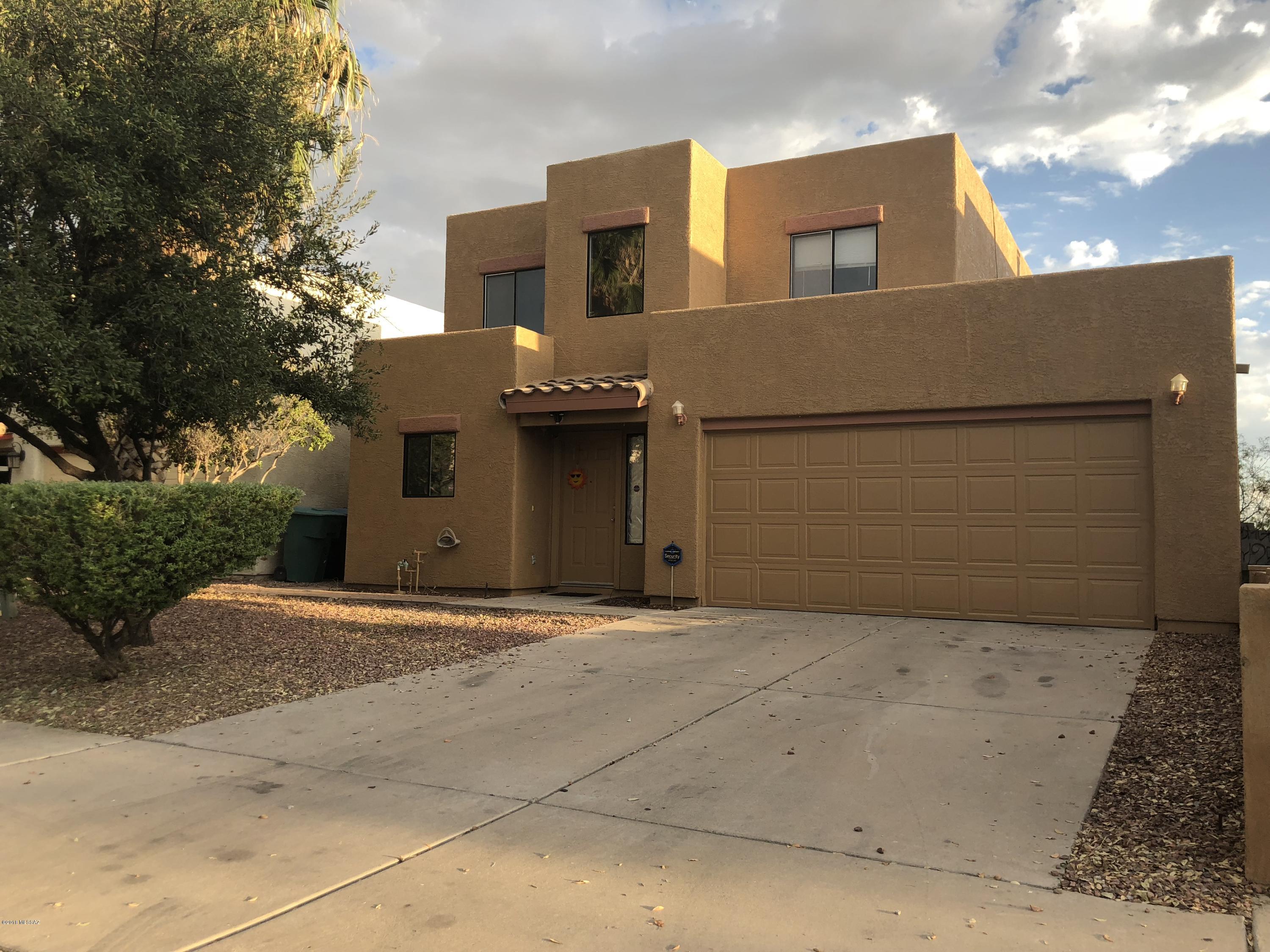 Ideal two story house with master bd on first floor. Lg 3 bedrooms upstairs. no neighbors on back. nice landscaped back yard with fountain, lg car garage. Close to schools and shopping and many extras.  Must see today.