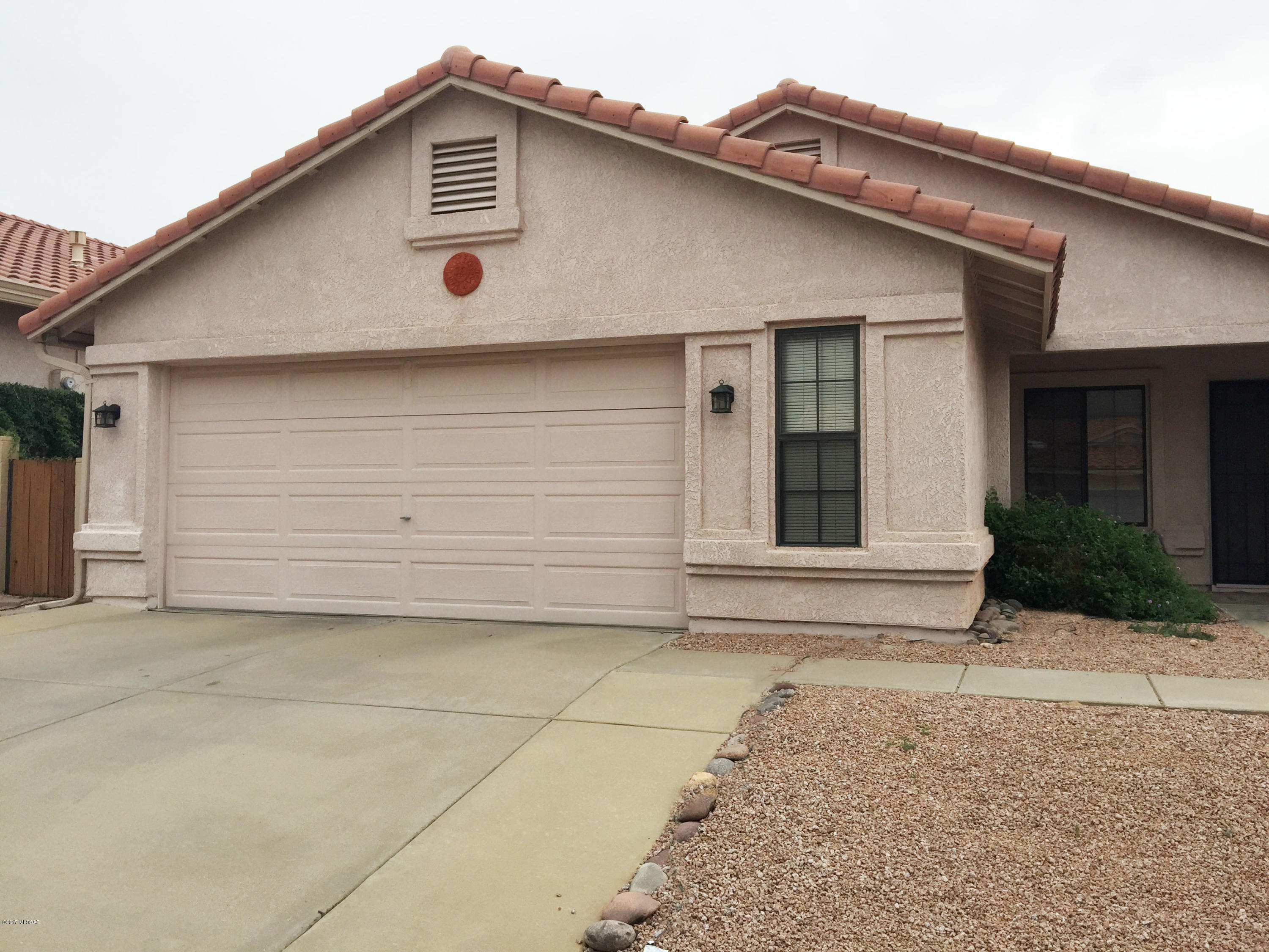 3 Bedroom, contemporary home built in 1992. Located in a desirable Oro Valley Neighborhood, this spacious home features a Great room with vaulted ceiling, kitchen nook with bay windows, formal living room with dining area with bay windows. This home is fully tiled, features custom paint, and each bedroom has ceiling fans. NEW kitchen countetops will be installed. 2 Car Garage. Appliances included dishwasher, disposal, oven/stove, refrigerator, countertop microwave, plus washer and dryer. Huge covered patio with easy care yard and separate side yard. Security Deposit $1,570. ***Rental Rate reflects a $65 concession for tenant's agreement to change the HVAC filters monthly. Rental Rates are $65/month higher than stated w/o concession.*** Pets Subject to Approval.