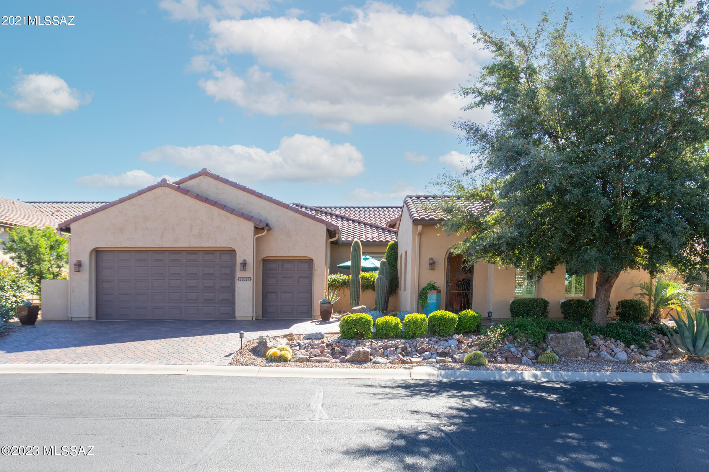 Words cannot describe this Brisa model with 3026 sq. ft. of luxury living overlooking the golf course and a full view of the Catalina Mountain range.  This home has numerous upgrades like 32 owned Solar Panels on the roof; motorized sunscreens; courtyard and patio Portico; 4 solar tubes; and water conditioning and reverse osmosis.  The Casita has a Murphy Bed for guests.  The Master Suite has great views of the mountains as you awake.  The En-suite contains double vanities, a soaking tub, and walk-in shower.  The guest En-suite is equally impressive. The ample Great Room is warmed by a gas fireplace.  The Morning Room is a perfect space for the first cup of coffee.  The extended Garage has a golf cart space.  This is a property that simply must be seen to appreciate true southwest luxury. The entire house both inside and out was recently painted.