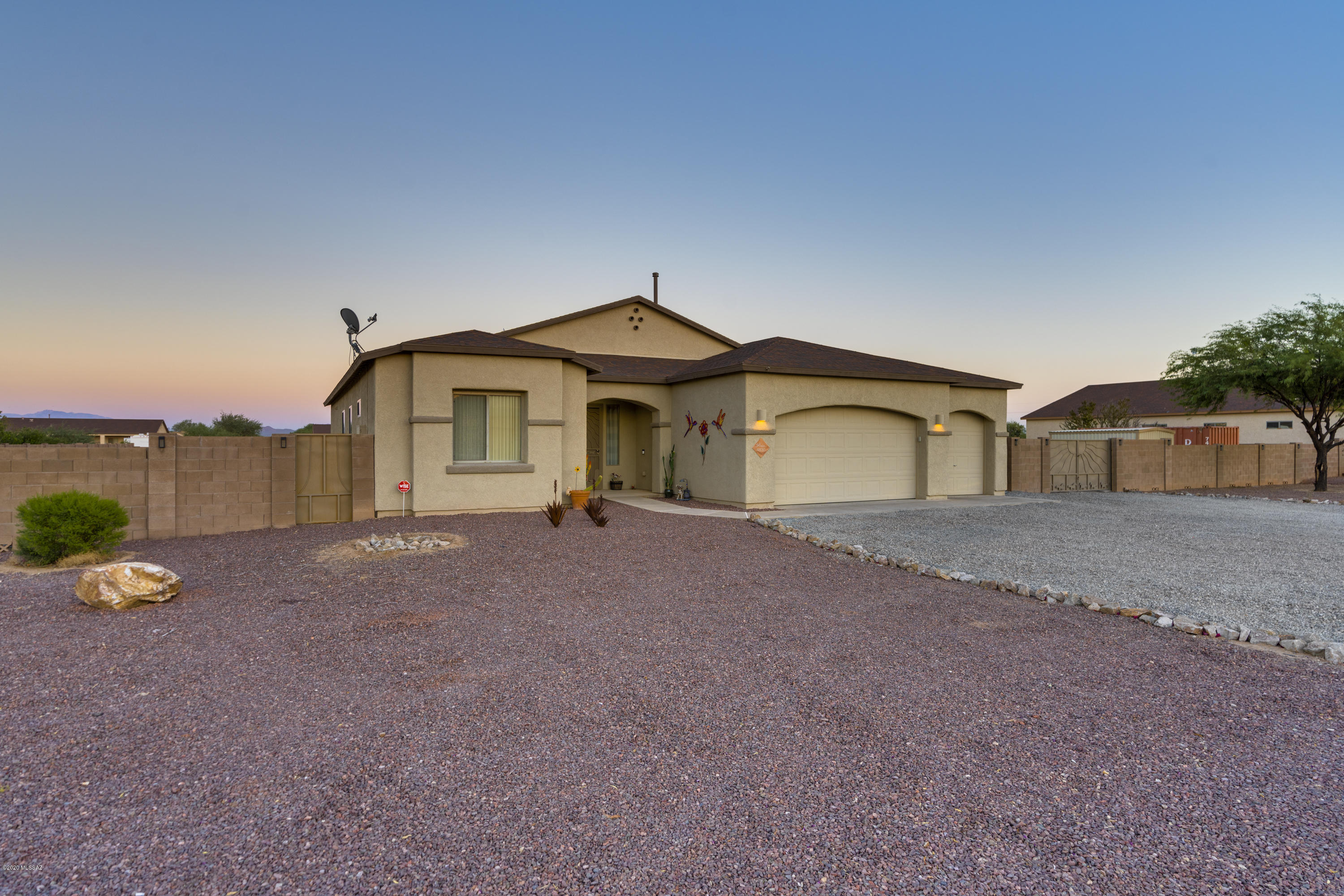 SELLER WILL ACCEPT OR COUNTER OFFERS BETWEEN $310,000-330,000. THIS ONE HAS IT ALL! Beautiful updates, mountain views & room for your RV, boat, toys and more! Great room floorplan. Updated kitchen w/granite, stainless, gas range & spacious pantry. Split 3 bedroom plan plus a den/office/craft room. High ceilings, tile in main living areas & carpet in bedrooms, 3-car AC garage w/epoxy floor and built-in cabinets. Covered patio & a huge lot w/endless possibilities, room for a pool & spa, trampoline, fire pit, extra workshop, Plus all of your toys! Walled yard with gated access. Enjoy mountain views in the daytime and wide open starlit skies at night!