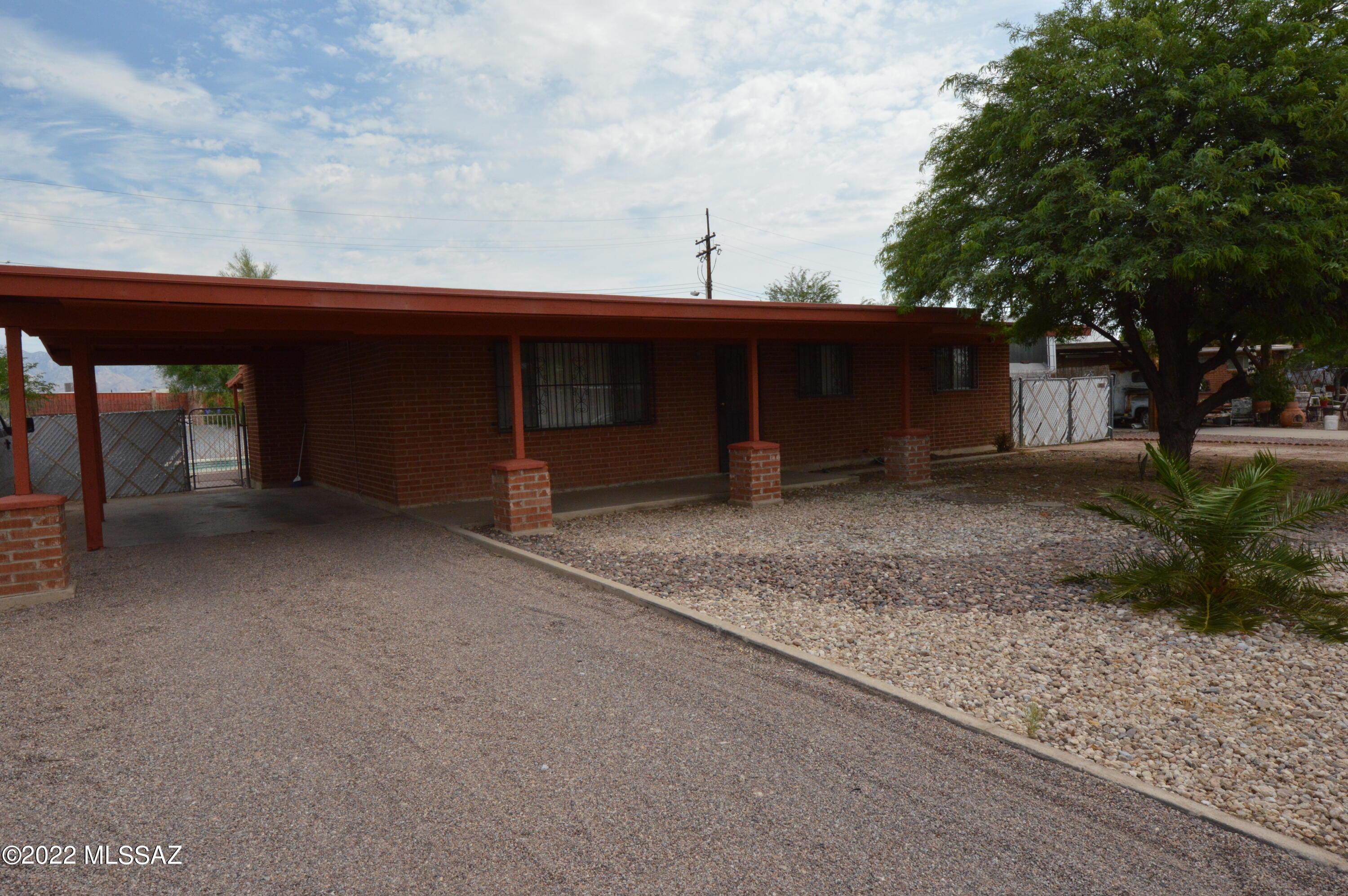 Great east side home with pool and large backyard. Home features 3bdrms/2ba. Great for entertaining with the open flow of the kitchen, dining and recreation rooms which lead to the patio and spacious yard. Updated kitchen with hickory cabinets. Large master bedroom with his/her closets. Backyard has a huge workshop/storage room. RV parking available.