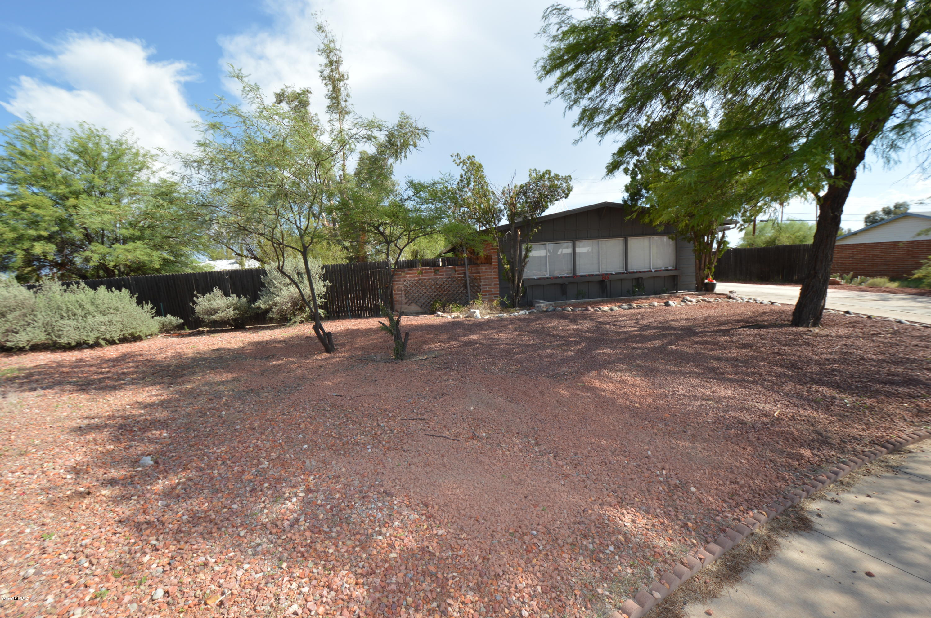 HUGE cul-de-sac lot in Sherwood Village, is priced to sell, and makes for a great starter home. Fresh paint, new roof coating, and new carpet await you in this east side home. Large lot provides ample opportunities of use. Boats, RV, camper, quads, off-road vehicles, gardening, etc. Bring them all as this huge lot has plenty of space for them all. Additional land behind the current fence is part of the property and can be enclosed to make the backyard even bigger! Backyard also has shade trees, paver patio, and three storage sheds. Home is closed to shopping, bus lines, and Jesse Owens Park. No HOA! Come see today before it is gone! Property is being SOLD AS IS.