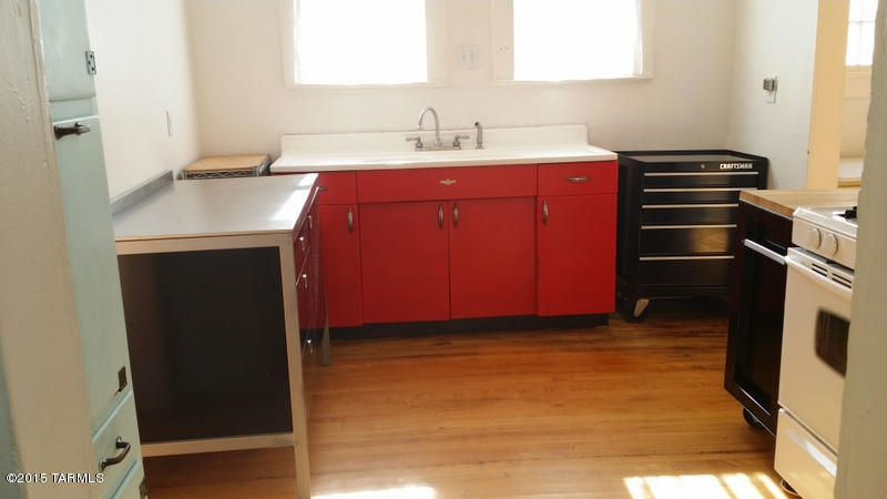 NEW HALL FLOOR/NEW JOISTS~MUST SEE THIS BEAUTY~Seller Just dropped to $100,000!... Exceptional Victorian 3BR/2BA beauty w spacious/open/light & bright 1623 Sf floorplan. Everything you could want in this charmer inc hard wood floors,remodeled yet vintage kitchen w walk in pantry or office,formal LR & Dining w/GAS fp. Toto toilets,claw foot tub,AMAZING 10'ceilings, dual pane PELLA windows w/invi-screens,updated elec & plumbing & newer roof! Dramatic sweeping views from windows & wrap around formal porch.Walk/weekend farmers market in the park or coffee shops & award winning restaurants.So much history & beauty in Bisbee to enjoy that everyday is a vacation especially waking up in this quiet neighborhood & lovely home. The world famous Warren Ballpark & Vista are just block away...