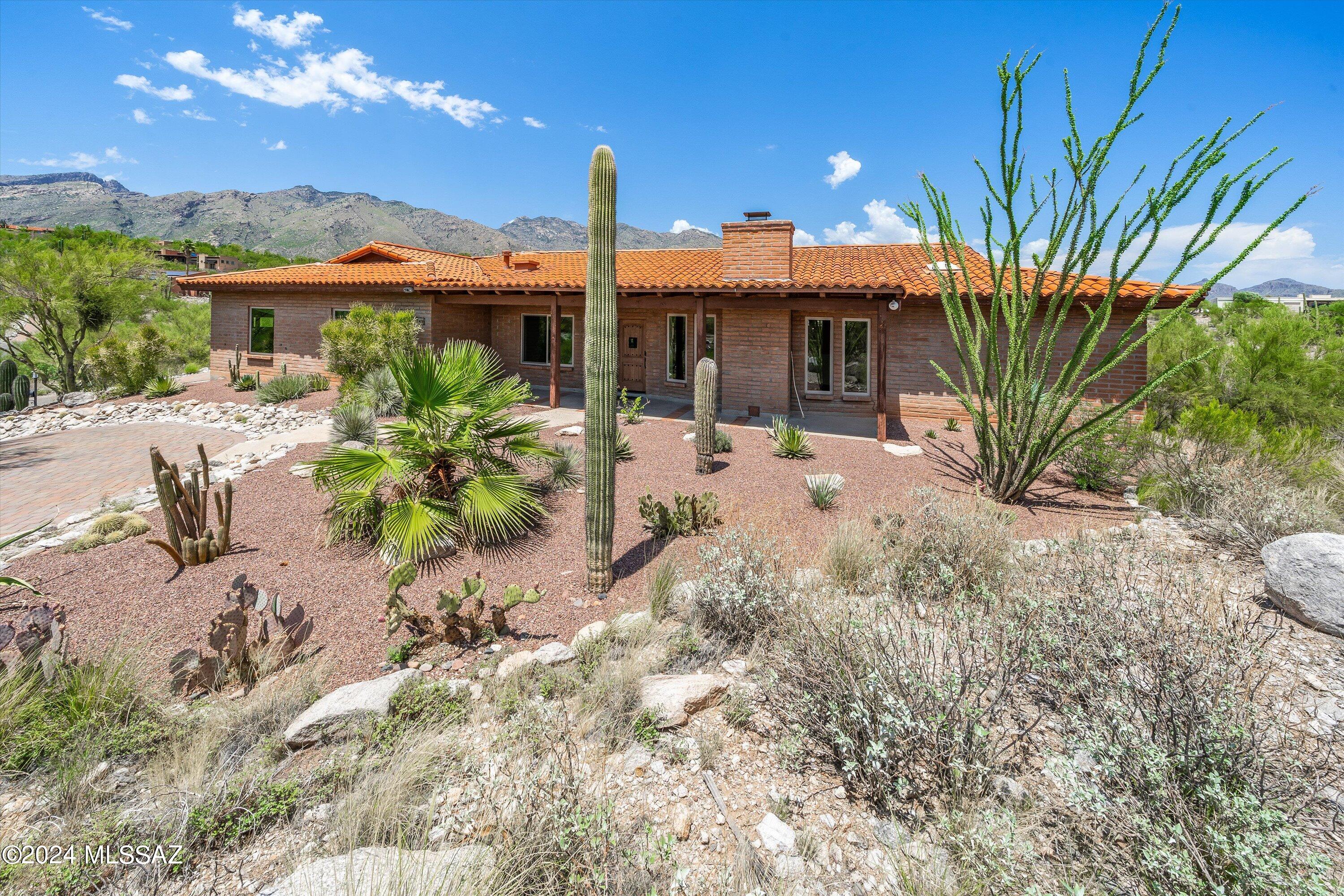 Perfectly situated on a 1.4-acre hilltop lot to capture city AND mountain views. No detail overlooked when this split plan,' was meticulously updated. All new windows & exterior doors, new porcelain & hardwood flooring thru out. Kitchen w/alder cabinets, granite counters, island, double ovens & views. Open plan offers spacious living/dining areas w/solid wood built-ins & stone fireplace. Primary suite w/fireplace, patio access, walk-in closet, jetted bath, separate shower & double vanities. Private yard w/pool/spa & unobstructed mountain views. Upgraded electric, LED lighting, smart locks & thermostats + many smart lights. Fully enclosed pergola w/turf keeps small pets safe. Whole house humidifier & filtration system.