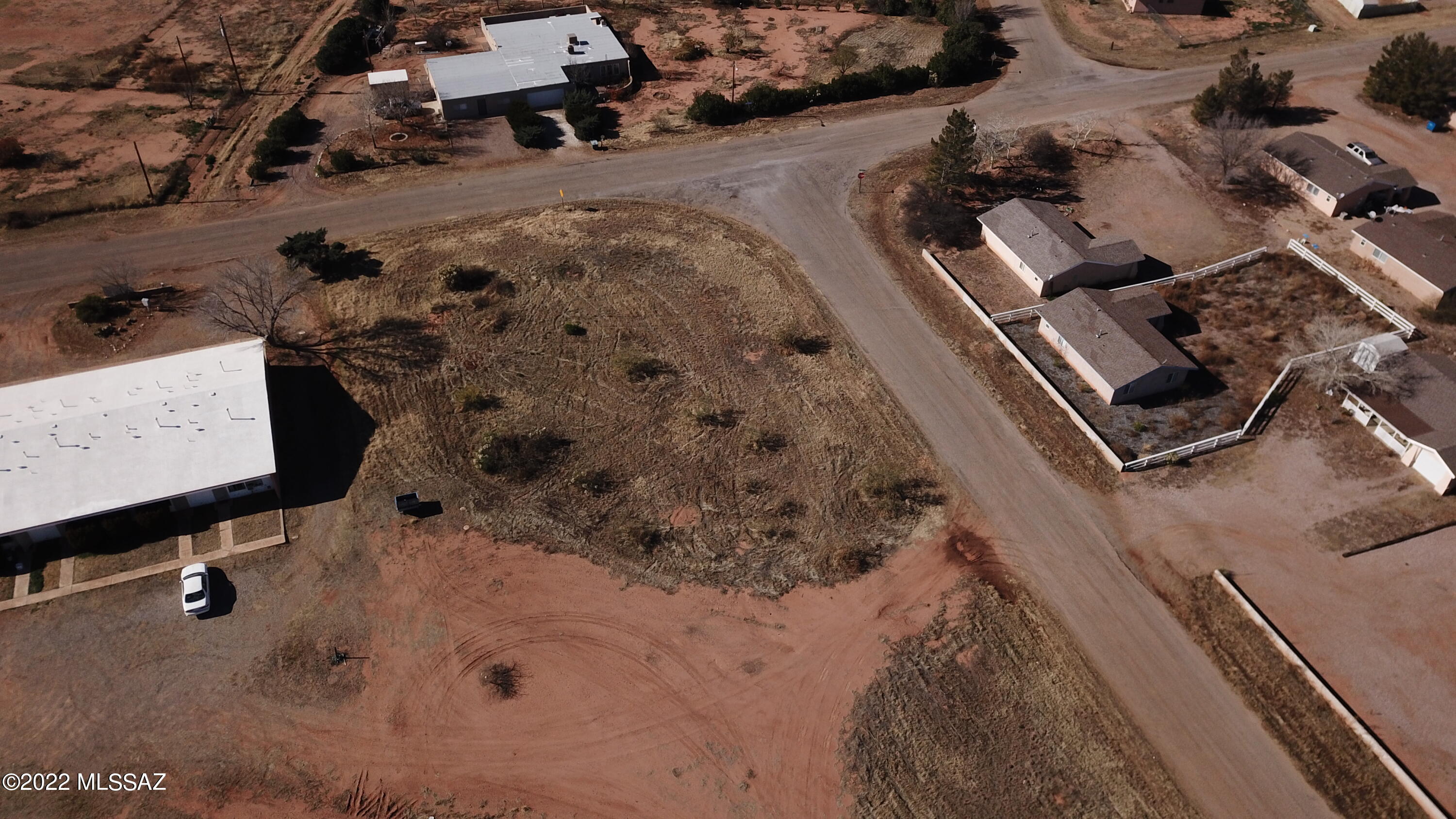 Price Reduced on this PRIME CORNER LOT is located in the heart of Sunsites and is just under 1 ACRE!  So close to Cochise Stronghold with great mountain views. This property is Multifamily zoned and allows residential & commercial rentals, professional, offices, and small retail business. Property is already zoned for 11 residential units.  Water, electric, sewer, phone, gas, cable - All to lot line. Don't miss out on the opportunities this lot offers!