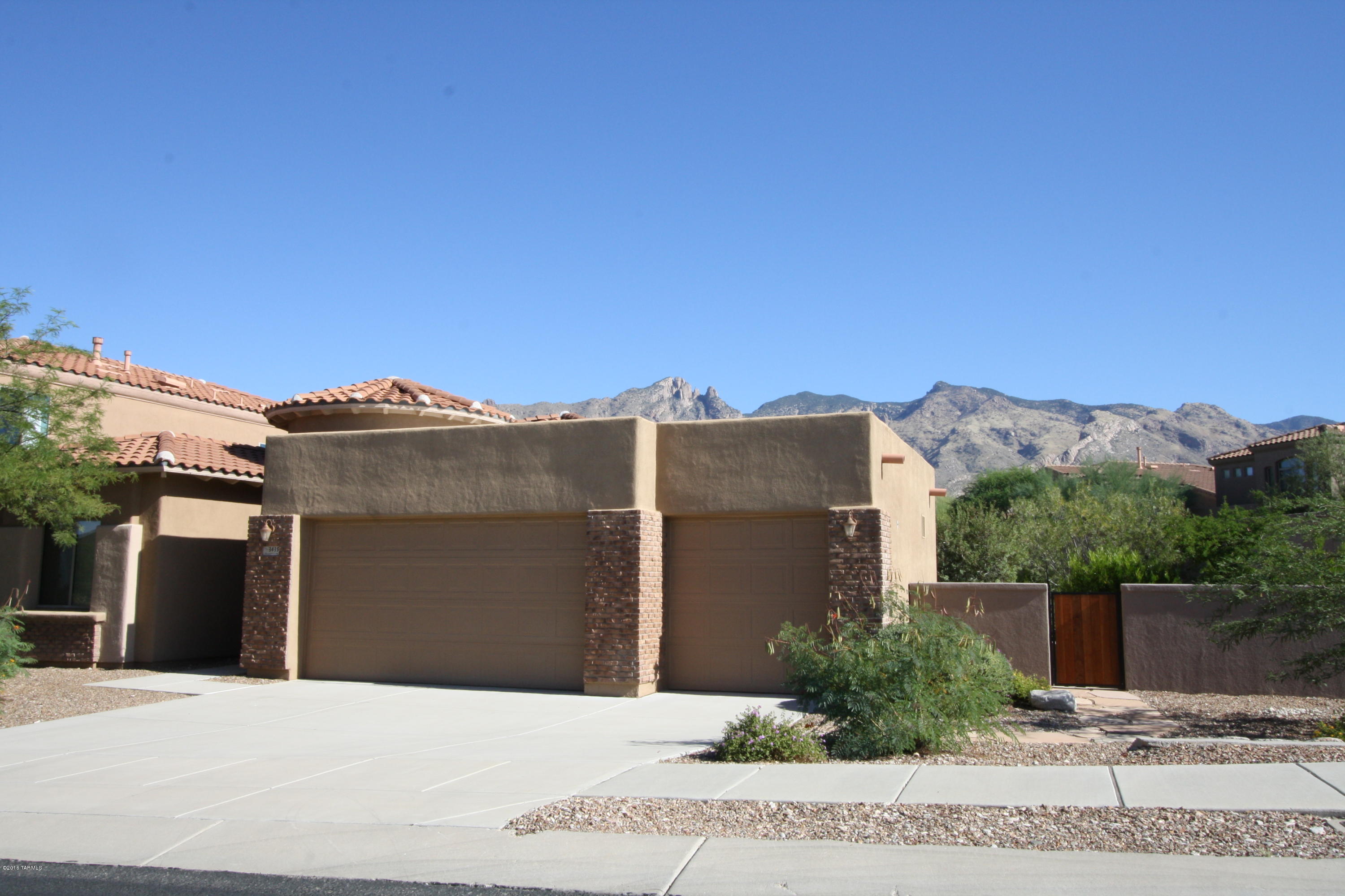 Located in Villages of La Paloma a gated/guarded community in the Foothills!
This 4bdr/2ba homes features a three car garage!
Living room w/fireplace, split bedroom floorplan, spacious backyard w/built-in BBQ and mountain views.