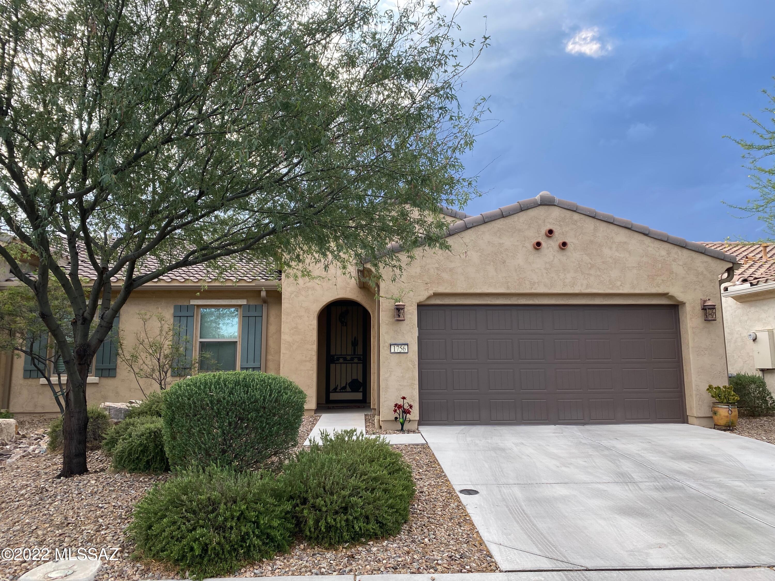 This ''Sagebrush'' Quail Creek Villa has an Open Floor Plan and it is Immaculate!  Are you ready to entertain your friends or just relax and watch the hummingbirds?  This home features 2BR/2BA, Granite C-Tops, Kitchen Island, SS Appliances, Gas Range, Cabinets w/Pullouts and 18'' x 18'' Ceramic Tile t/o. The bedrooms have interlocking flooring planks!  Why Build New?  Approximately $60K in upgrades which include, Extended East Facing Back Patio w/ Pavers, Tile Upgrades, Backsplash & Tile Shower, Glass Door, Custom Blinds, Cabinets, Paint Color, Water Softener, C-Tops, Dishwasher, & Fans.  New Washer & Dryer, 2020. Enjoy the sunrises from your patio or just spend some Quiet Time in this Cozy, Friendly, Neighborhood.  Either way, this Villa is Move-In-Ready and Waiting for you!
