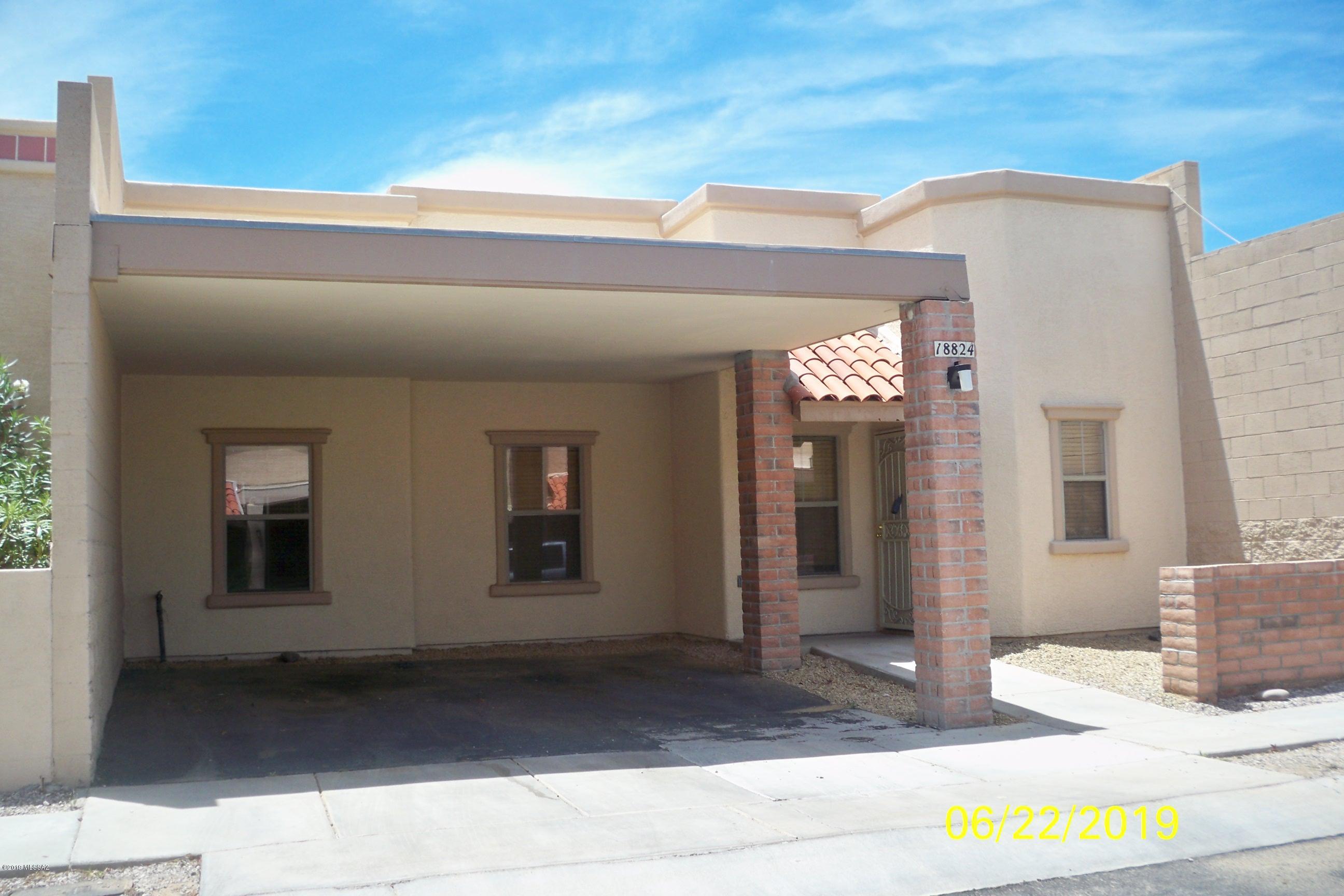 Real nice contemporary town home located in a quiet residential community! This home features three bedrooms and two full baths, freshly painted in the interior and all tile flooring!  Two car carport, private yard area with a patio, sparkling clean community pool/spa and a community center with exercise facilities!   Convenient location for access to major roadways, shopping and amenities!  CHECK IT OUT!!