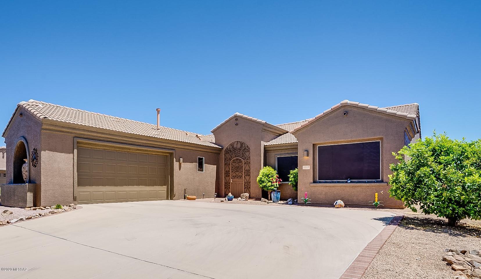 This gorgeous super clean, well-maintained 3BR, 3BA and den home in gated Canoa Ranch provides hours of social and recreational free time. As retirement should be – Instead of grabbing your tools, reach for your golf clubs or racket. Both the golf course and rec center with pickleball courts, pool, fitness center are just around the corner. A gourmet kitchen, huge great room and expansive patio of intricately laid pavers and desertscape create the perfect space for any size gathering. Two large picture windows highlight the mountain peaks and Elephant Head as they ''turn pink'' in the late afternoon. If you are an early riser, the sun inching over the mountain peaks greets you from the comfort of the master suite. This is 1 of 2 ensuites. Glistening black granite, maple cabinetry, pendant lighting, diagonally laid tile, ceiling fans throughout represent the starter list of interior upgrades. New exterior paint (April 2020), new landscaping (2019), new water softener (2018) and HVAC (2019) minimize maintenance concerns.