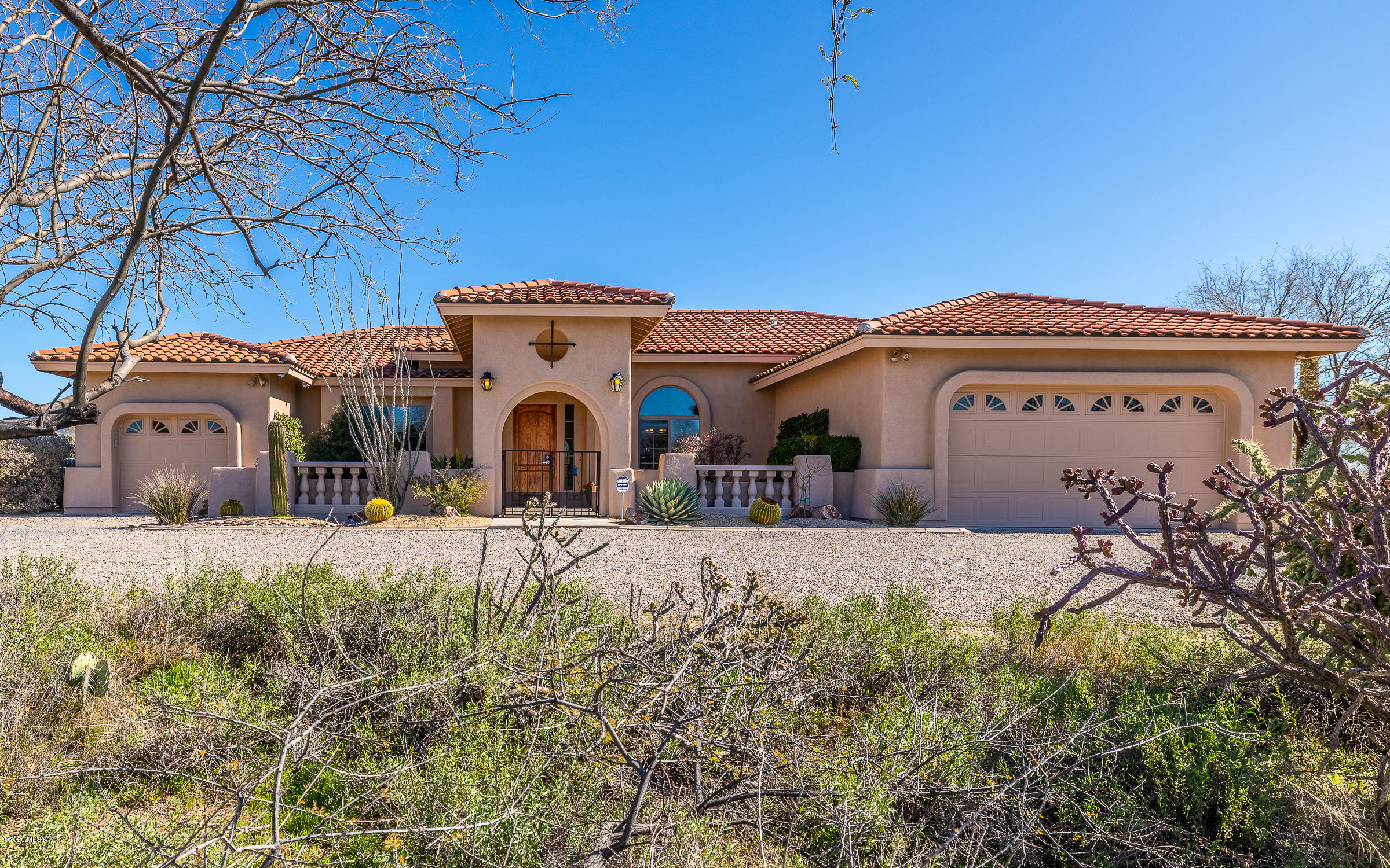 Lovely one story, custom, C&C home on just over 4 acres. Courtyard entrance, open natural desert behind home. Entertaining backyard with water feature, fire pit multiple seating areas, fruit trees, grass area & stunning mountain views and designed for a future pool. Interior features handcrafted, custom, alderwood  cabinets and knotty alderwood doors throughout home. Greatroom floorplan with granite in kitchen, pull out, dovetail cabinets, gas cooktop & upgraded pantry. 3 bedrooms with additional bonus room for office/den/gameroom. With a split bedroom floorplan, master bedroom & ensuite offers sliding door to lovely patio, dual walk-in closets along with an oversized shower & separate garden tub.  Additional storage building/wk shop,  approx 10x20, with power & water. This is a must see!