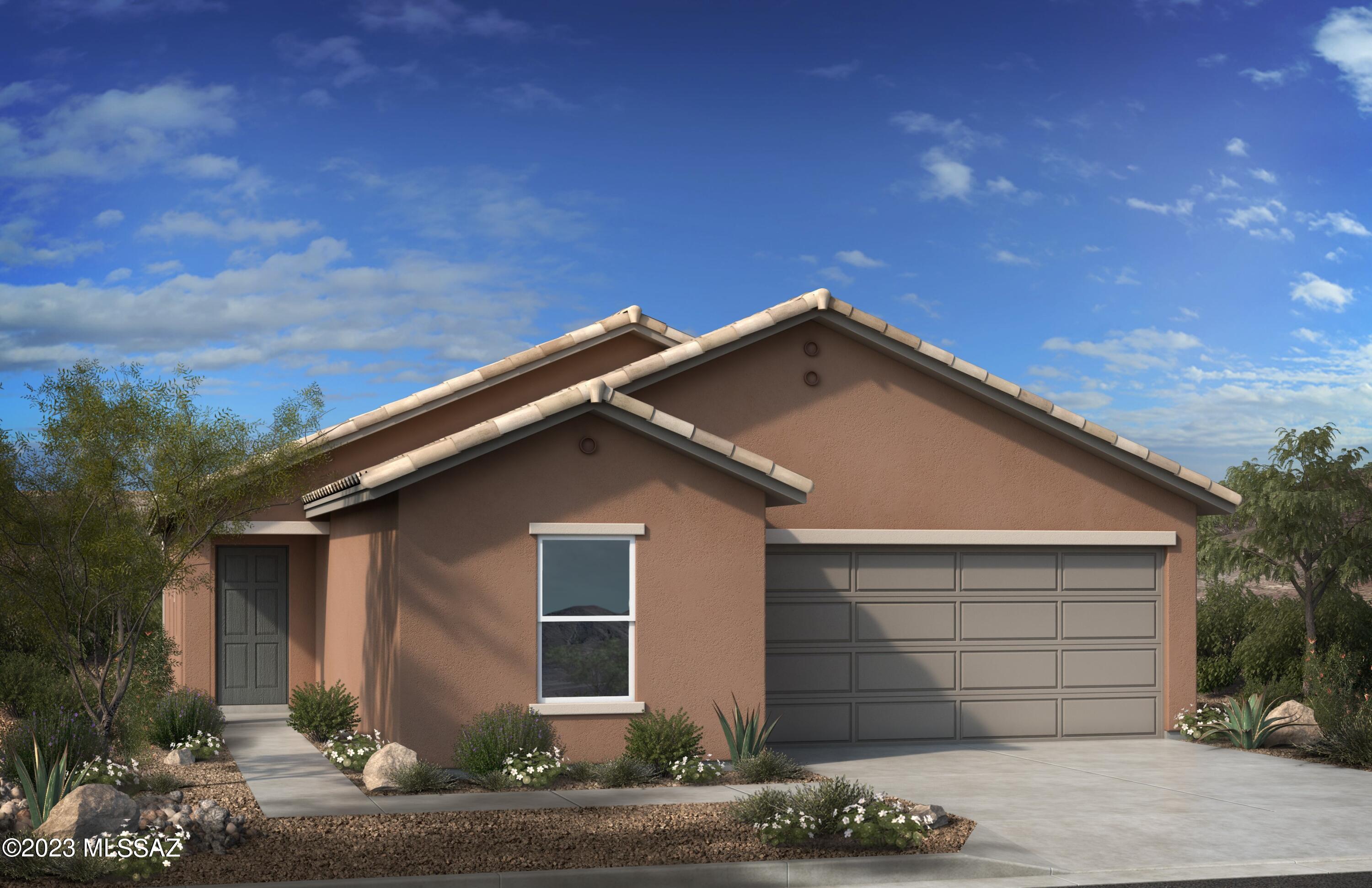Set on a spacious homesite, this single-story home features an open space floor plan with 9-ft. ceilings. The expansive great room leads to a covered back patio. The kitchen showcases granite countertops, 42'' upper cabinets, an island, walk-in pantry, and Whirlpool® stainless steel appliances. The primary suite boasts a walk-in closet, dual sink vanity, and shower with cultured marble surround. Homeowners can enjoy access to a community playground, ramada, and dog park, as well as Tucson Loop. Ask about our special rate buydown and closing costs incentives. Any incentives are tied to seller's preferred lender KBHS. Projected closing month is March 2024. Property taxes are not available to date.