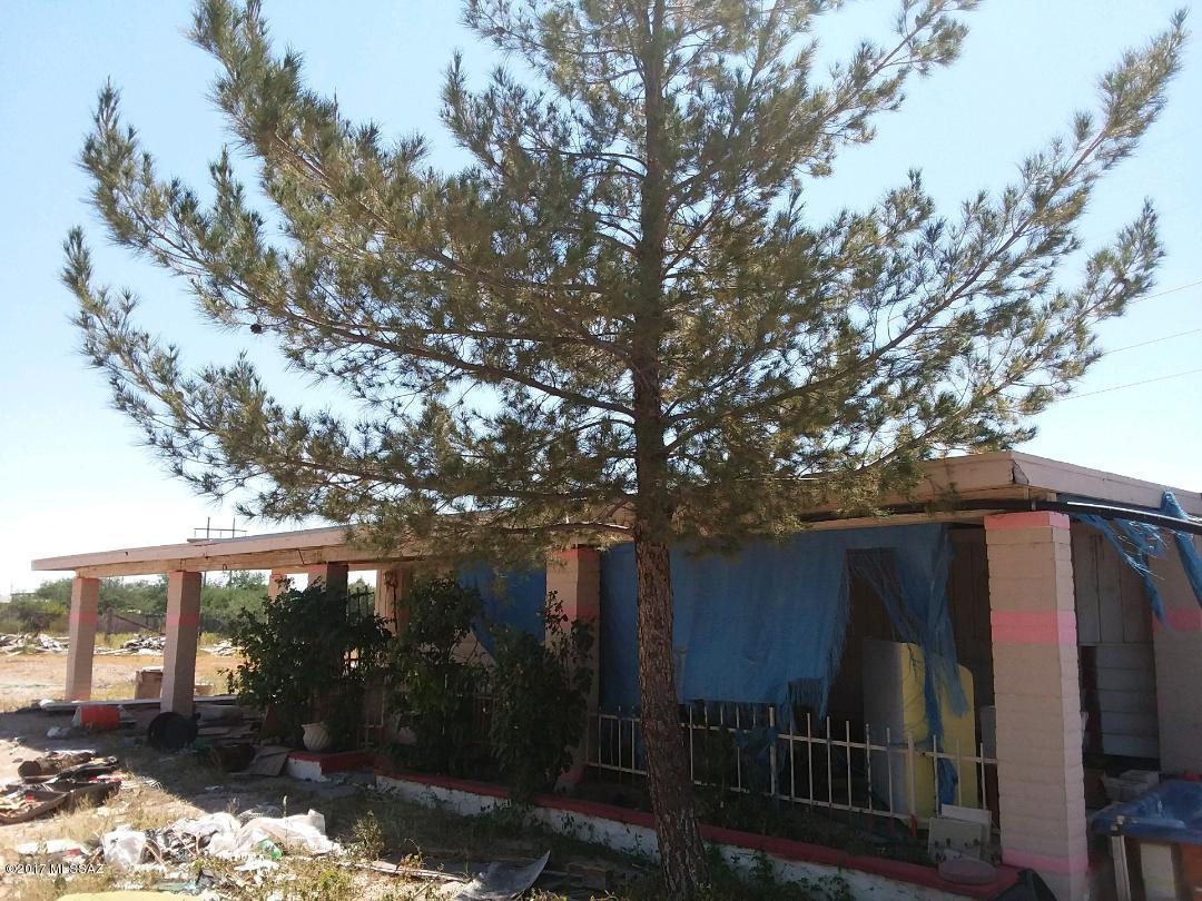Great usable acre of land with utilities to the home site. Old  manufactured home that is not affixed to the property. Home will need to be removed or repaired at buyers expense. Seller has never lived in the property and no SPDS or CLUE will be provided. Property is being sold AS IS.