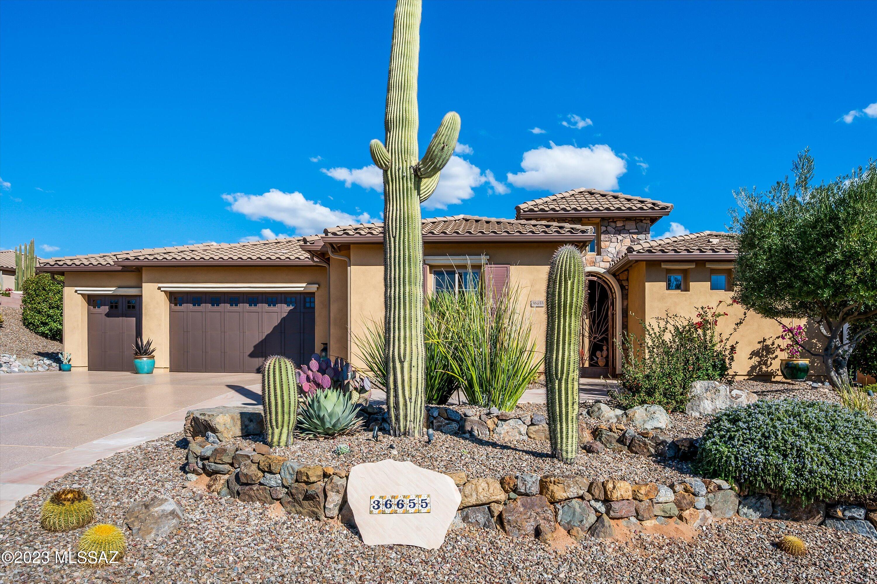 Beautiful golf & mountain views from inside & outside this open & spacious Sonoran model.  A welcoming courtyard w gas fireplace leads to a private casita.  The great room's wall of windows takes full advantage of the views. A wet bar is a great gathering space & leads to the open kitchen w upgraded stainless appliances. A butler's pantry w walk-in pantry leads to dining room.  Spacious owner's retreat w sitting area, en-suite w soaker tub, separate shower & dual vanities + large walk-in closet connected to laundry room. Convenient Den with wood floors, private guest suite + separate casita completes this beautiful home. Covered patio & extended hardscape w large spa is ideal for entertaining or enjoying golf & mountain views.  The perfect Preserve home to enjoy the SaddleBrooke lifestyle