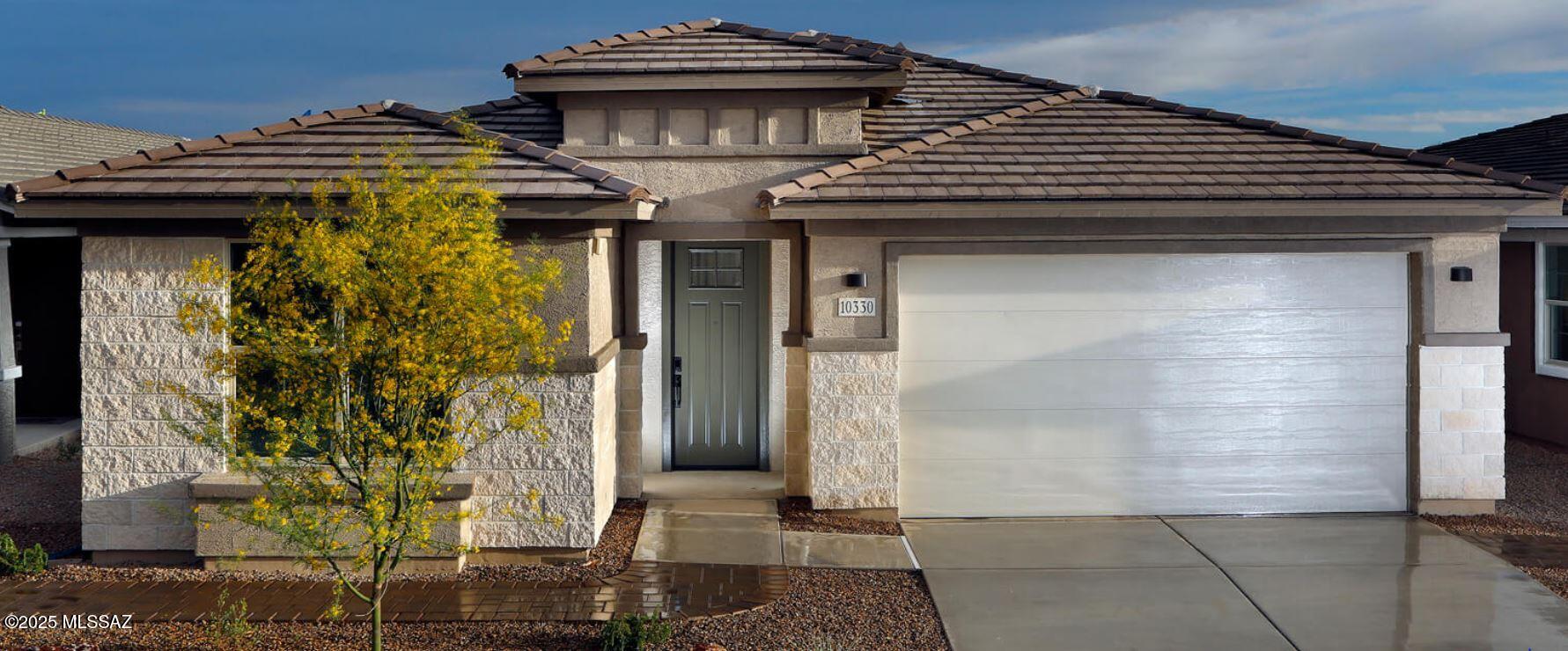 Rock Bottom Pricing. No finance incentives will be provided.

This 3- bedroom, 2-bathroom home comes with a  flex space that can be a great home office or hobby space. The kitchen has Umber cabinets with shaded grey granite countertops, wood-look tile and the bedrooms comes with multi tone carpet. To complete the home for you Meritage has included stainless steel appliances, fridge, washer/dryer, and blinds on all windows. Visit Houghton Reserve and explore new homes in Tucson, Arizona. This gated community is located at the northeast intersection of Broadway Blvd and Houghton. Located 11 miles north of I-10, Houghton Reserve provides convenient access to major employment centers, nearby shopping, and dining.