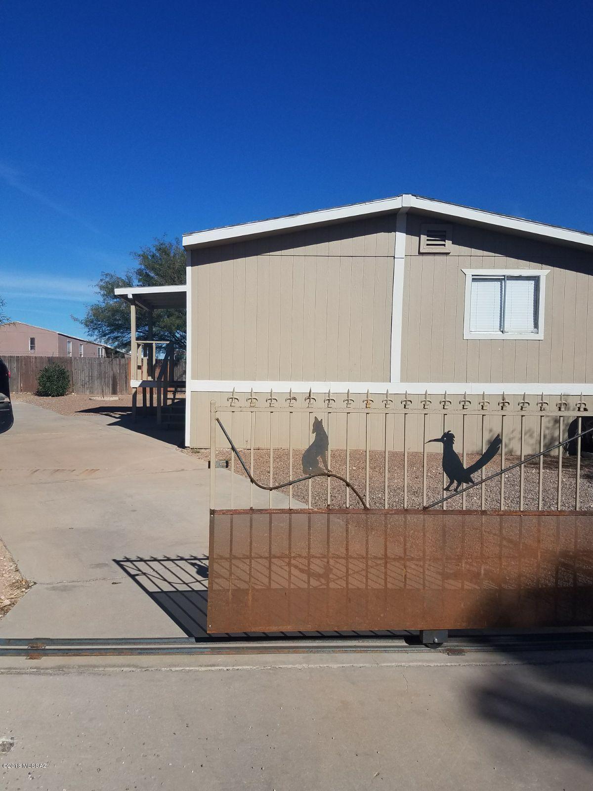 This is a beautiful manufactured home 3 bedrooms/2 bathroom.New paint inside and outside  This home ready to move in.The HOA dues are only $10/month.No rentals allowed in this HOA.  Great location close to shopping, transportation and schools and much more.