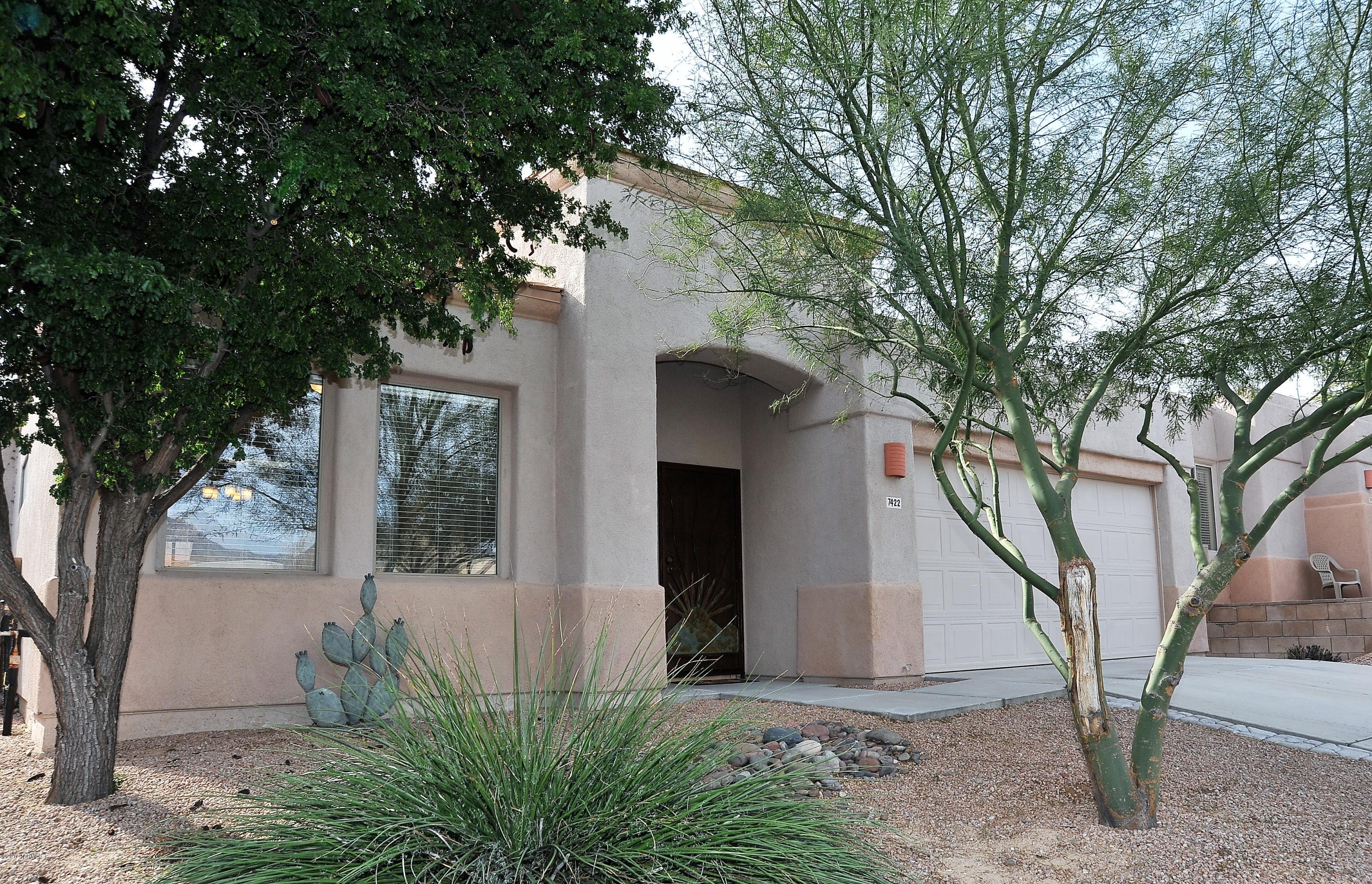This move-in ready home is located in the quiet gated community of Rancho Esperero, and has one of the larger and more open floor plans this neighborhood has to offer. 3BD/2BA, located on Private Cul-De-Sac! Very Clean and freshly painted interior and garage. High ceilings, skylights, matching appliances, and many upgrades. Some Upgrades include: 3 foot master extension; sliding glass patio doors in family room and master bedroom; Privacy glass block in master bath and front door; ceiling fans in every room including patio; Bonus closet in guest bedroom; Cabinets in laundry rm. Enjoy Mountain top views. Steps away from one of three community pools and spas. Located close to Udall Park, Sabino Canyon, restaurants, shopping, resorts, and Tucson Country Club. Listing Agent is related to selle