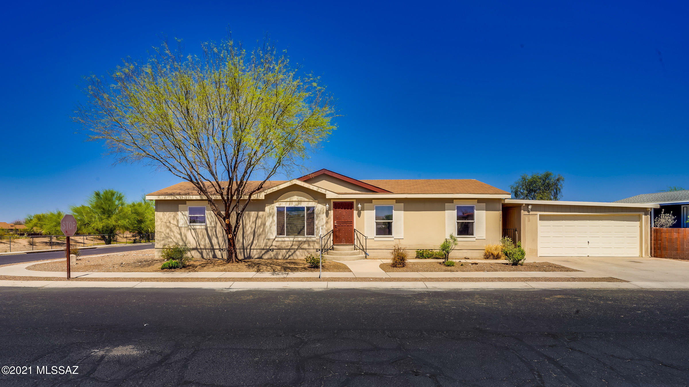 **Range Priced**  $155,000-$165,000
Beautiful home Located in the wonderful gated community of Window Rock. Home sits on a large corner lot with detached finished 2 car garage. Large yard has plenty of space for all your outdoor activities. Gated community, community pool, LOW HOA.. Come see this today.