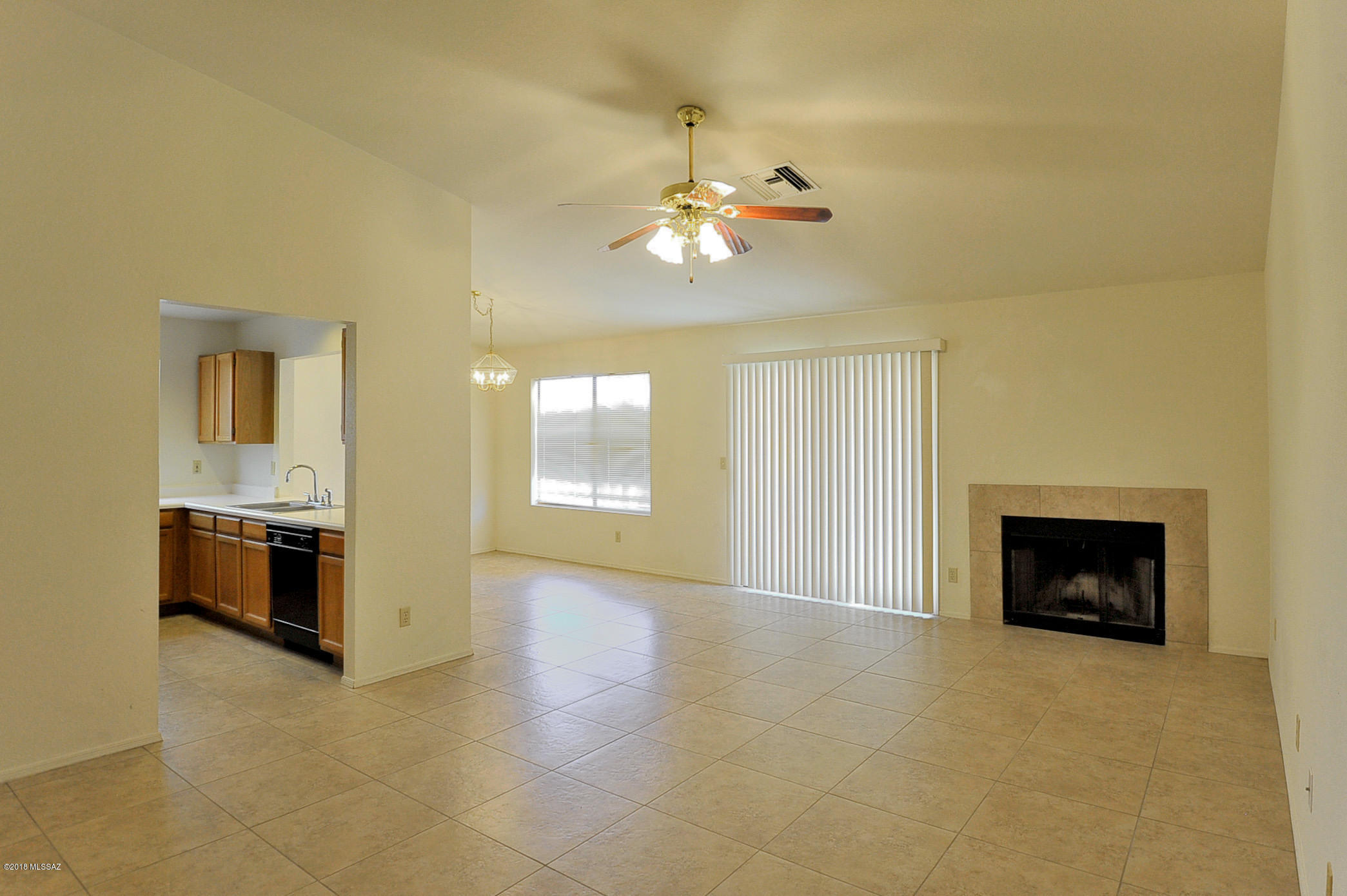 Great NW location!!  Lots of tile in all areas except 2 bedrooms.  Freshly painted with 2 bedroom plus Den!!  Master suite is split plan with dual sinks tub/shower, laundry closet for your washer and dryer.  Fireplace, kitchen has gas cooking, refrigerator, ceiling fans throughout, 2 car garage with lots of storage. Community Pool and Spa. Located in a Cul De Sac. Ask about P#2785-Q