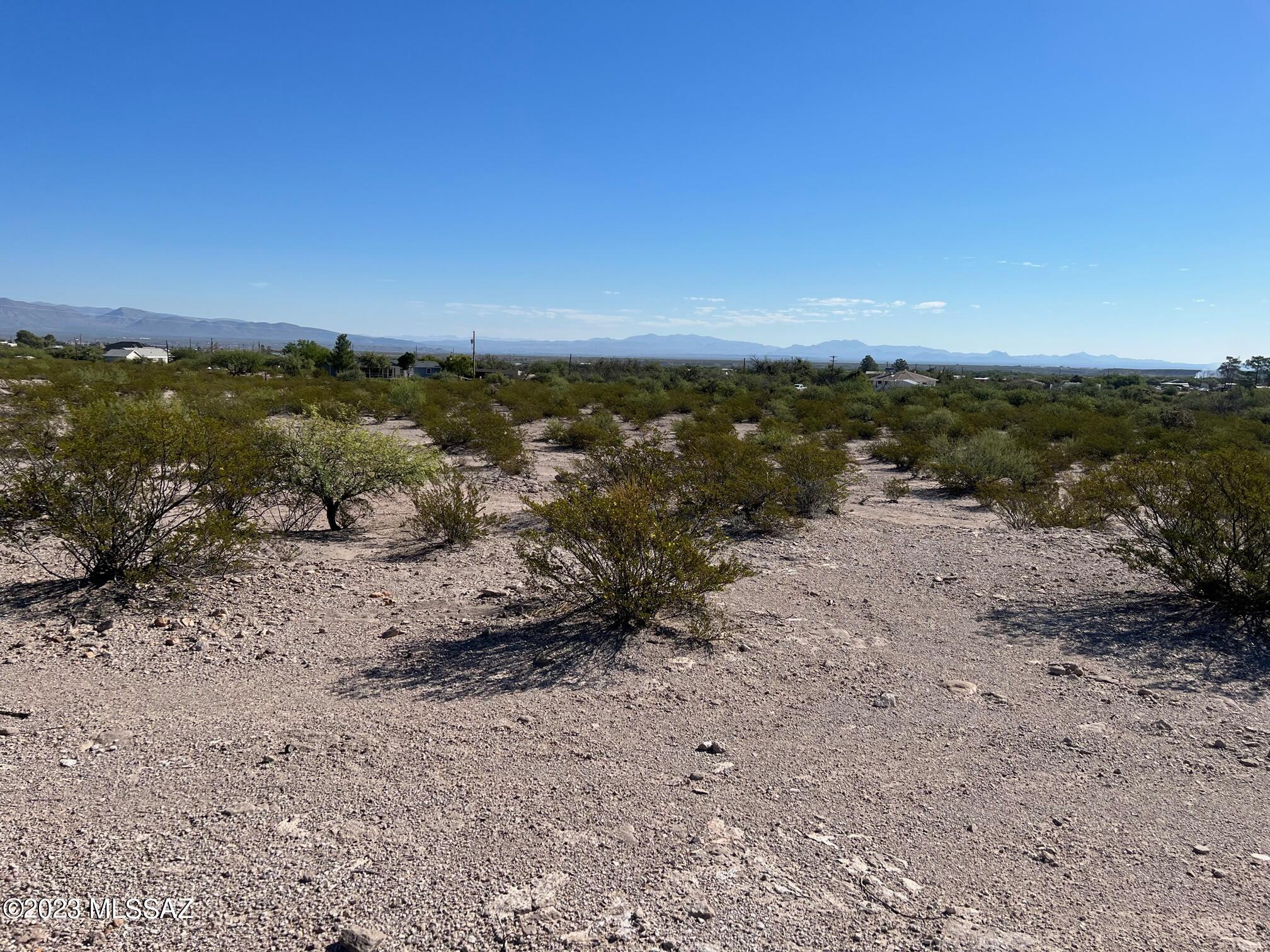 Need some elbow room?  Come look at this over 2 acres- not in a flood zone with water - paved road- All utilities available south of Safford- Will be a great place to build or bring in a manufactured home!