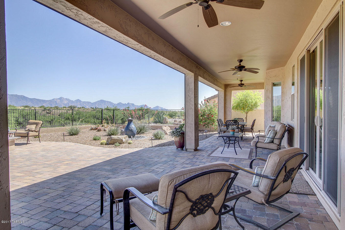 VIEWS,VIEWS from this Magnificent Covina Model w/Casita. FEATURES: One of the best Premium Lots, Separate Casita w/inviting brick paver courtyard, New $10k Granite & backsplashes in kitchen, Cherry Staggered Cabinets, Fireplace in GR, $6500 AZ Electric Rolling Shutters, Upgraded SS Appliances, Shutters & Custom Shades, Crown Moldings, Custom built-ins in Master Closet, Surround Sound, 4' extended garage w/added cabinets, Golf Cart Bay, French Doors into Den w/Built-in Cabinet, Master bedroom with Bay Window & MORE VIEWS, Epoxy finished driveway & garage floor, Gutters & Downspouts, Wrought Iron & Block Walls, Extended brick paved patio w/fire pit, Custom Courtyard & front entry iron doors, Kinetico water treatment. 2 Water Fountains. Very Private Setting w/greenbelt to one side.