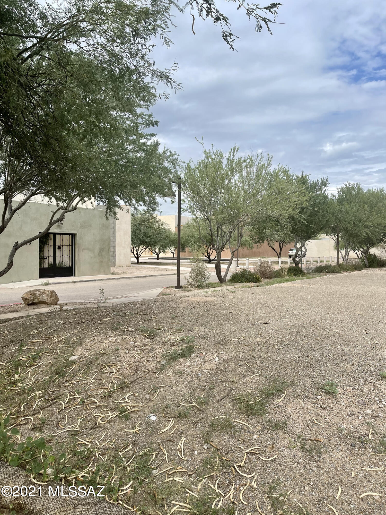 Excellent opportunity to own one of the last remaining lots in the award-winning Mercado District of Menlo Park, adjacent to downtown Tucson!  This 4000 sf lot is three sided, on the corner of Calle de los Higos and Palo Fiero, in the heart of the Mercado district.  Bring your vision to design your dream home!    This community is built around public plazas, with walking distance shopping at the Mercado San Agustin, The Annex, and the Monier.  Street car stop right here, so easy access to downtown, UA, and UMC/Banner!   Owner/agent.