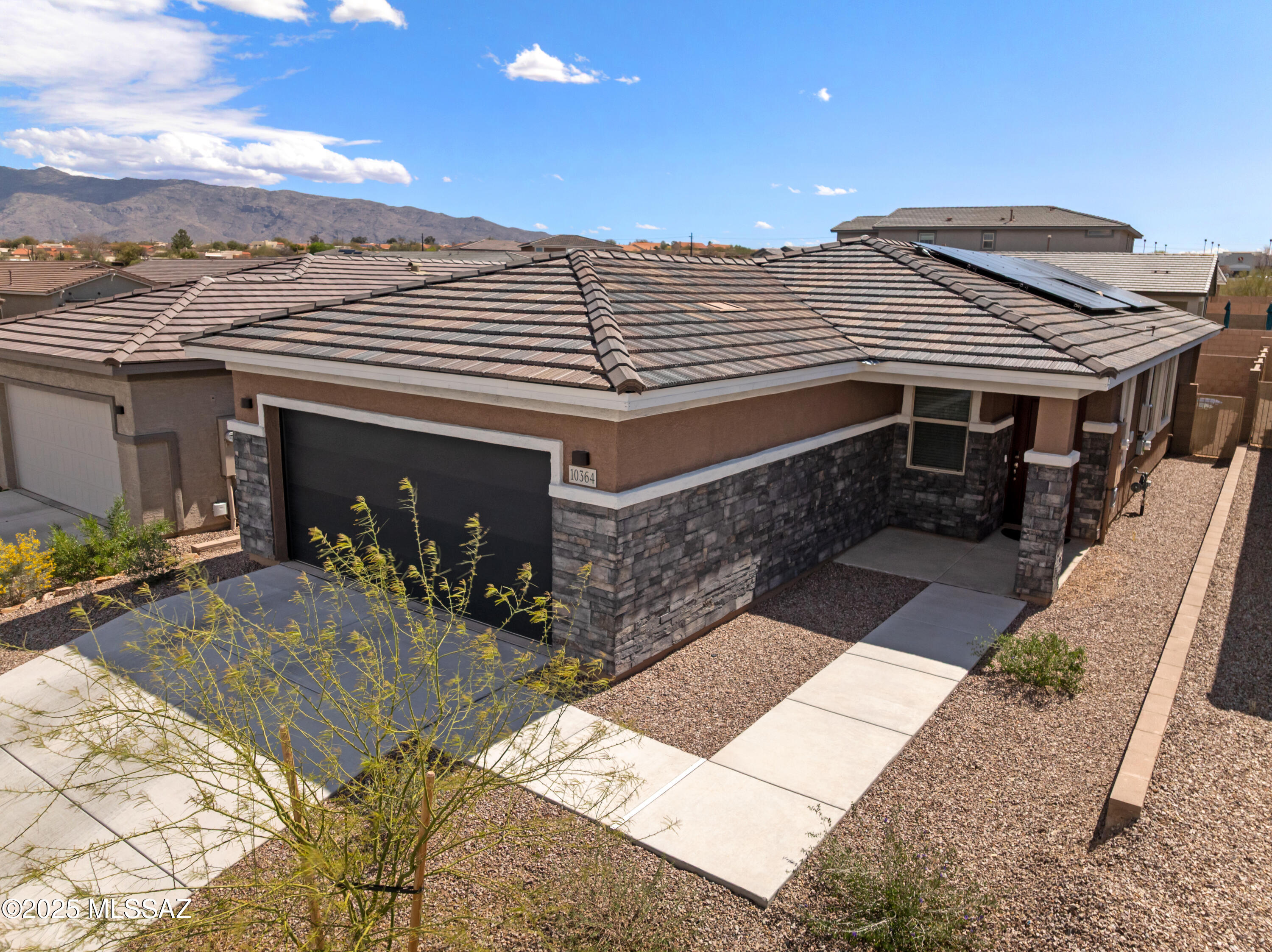 Nestled in the serene and spacious North East of Tucson, this lovely home welcomes you with open arms. Imagine stepping into a peaceful retreat where the quiet hum of nature surrounds you, framed by the breathtaking backdrop of the Rincon and Catalina mountains. Their majestic peaks rise gently in the distance, offering a daily dose of tranquility that feels like a warm embrace.

This charming property sits right next to a delightful neighborhood park, just a short, leisurely stroll away—perfect for morning walks or an afternoon of relaxation. The house itself has been cared for with such love and attention, its well-maintained spaces radiating a sense of pride and comfort. Here, you'll find a little haven that blends the beauty of the outdoors with the coziness of home, waiting to wrap you in its calm and inviting charm.