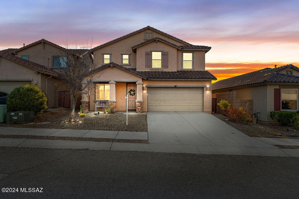Welcome to Vail - where award winning schools are only the beginning of the long list of items you are sure to love about living in this spectacular southern Arizona community ! As you step into your expansive almost 3000 sq. ft. former model Home you'll be greeted by an abundance of space and style. The heart of this home is undoubtedly the backyard oasis, where relaxation and entertainment seamlessly blend. A shimmering pebble tech pool is loved on warm Arizona days, complete with a playful slide and soothing waterfalls. The outdoor space is a true retreat, featuring a charming pergola, a thoughtfully covered patio perfect for savoring those summer evenings, and the added bonus of no rear neighbors, providing unparalleled serenity and privacy. Inside, discover a versatile layout designed for modern living. A convenient full bedroom and bathroom downstairs offer flexibility and ease, while the upstairs reveals a spacious loft and the convenience of a laundry area. The chef's kitchen is Perfect for large family gatherings and entertaining guests. With granite countertops, deluxe cabinets, stainless appliances and ample storage space, you are able to host friends for brunch or enjoy quiet family moments, this home provides the ideal backdrop for creating cherished memories.
With leased Solar panels you can rest assured that your cooling costs will be kept low, especially helpful with a home of this size!
Don't miss the opportunity to make this your forever home in the sought-after, thriving community of Vail.  Welcome to your dream lifestyle!